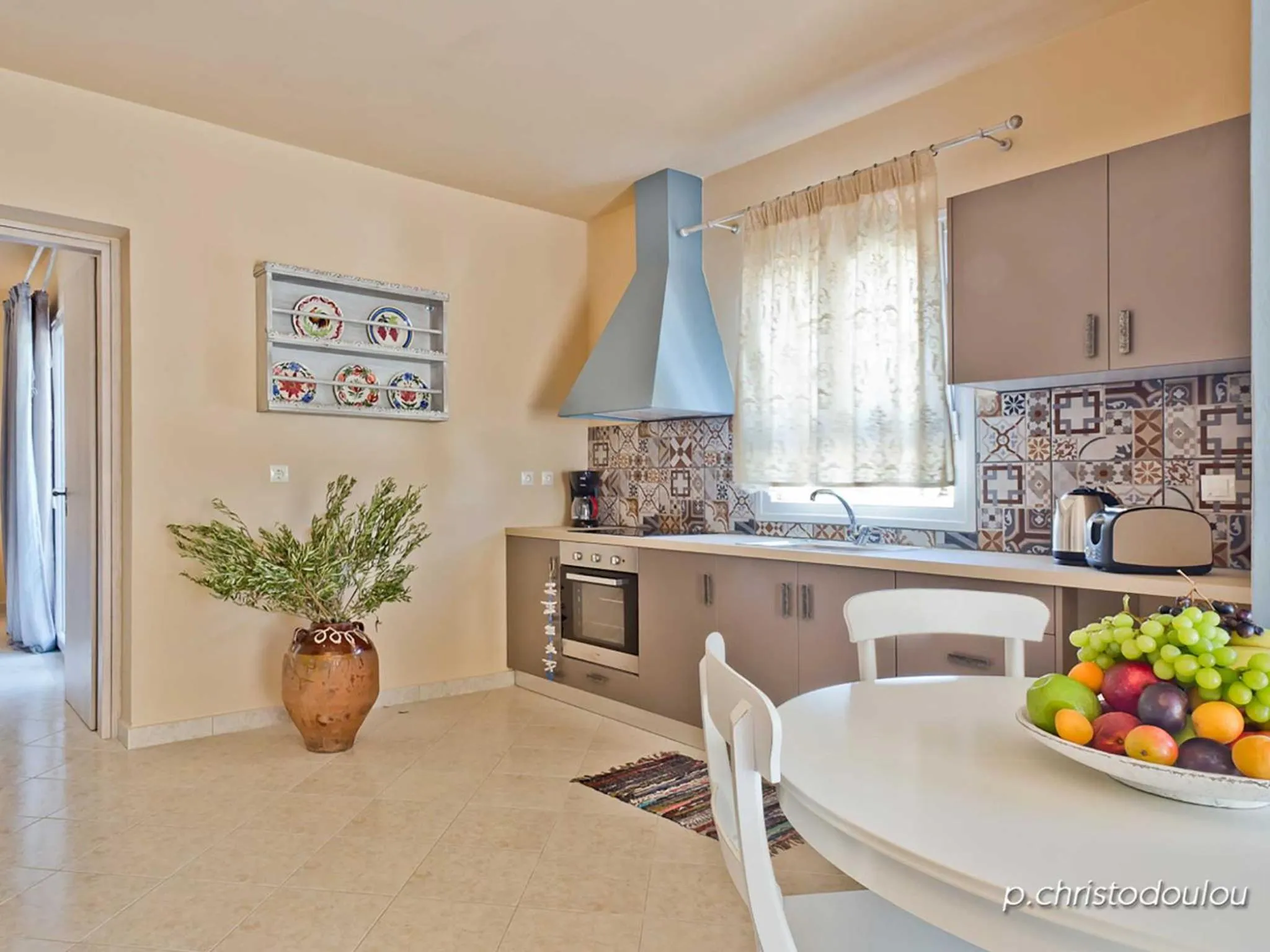 Kitchen or kitchenette in Elaia Villas