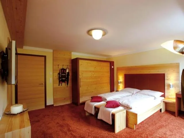 Bed in Hotel Riederhof- Urlaub mit WAU!