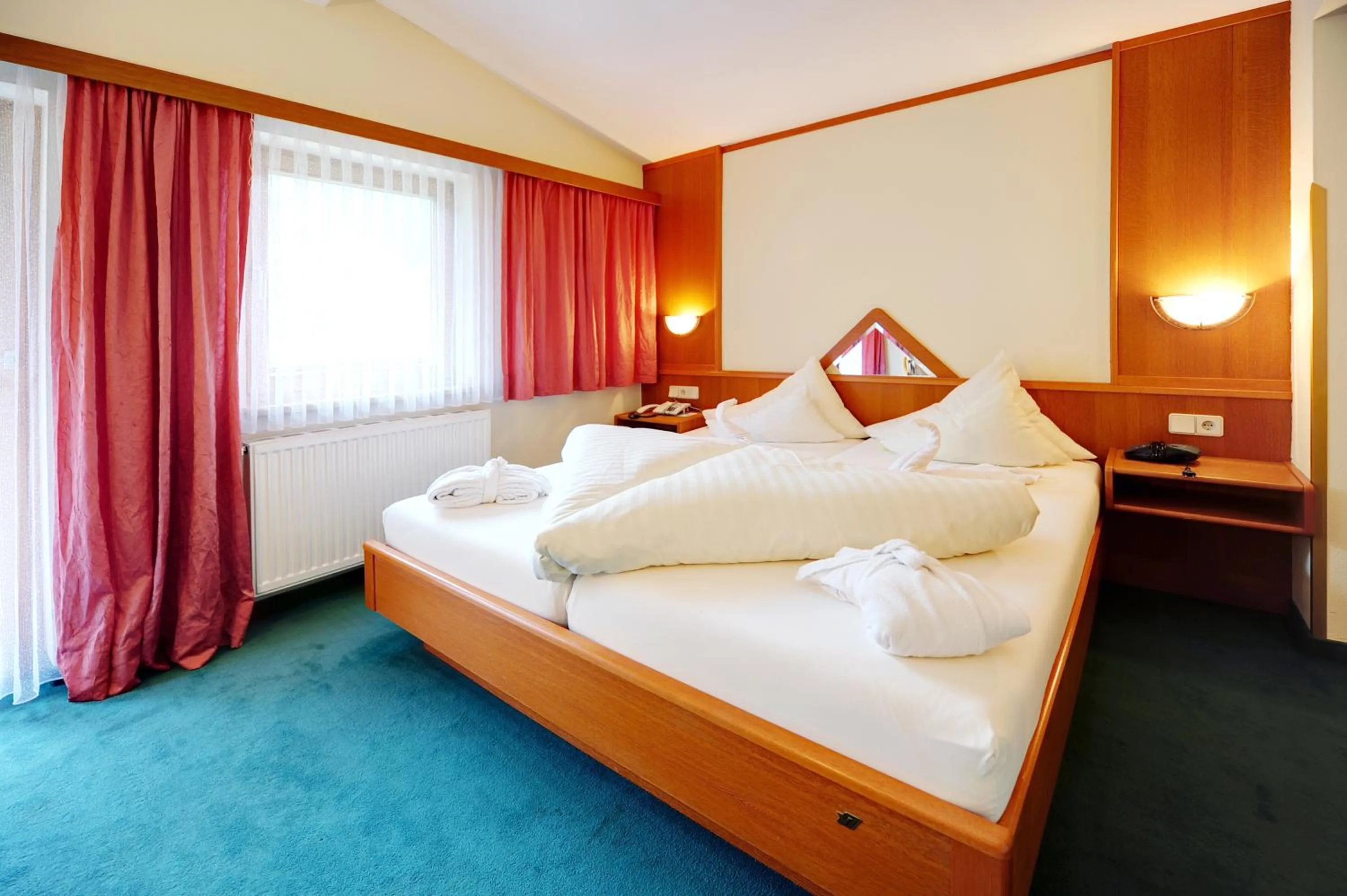 Bed in Hotel Riederhof- Urlaub mit WAU!