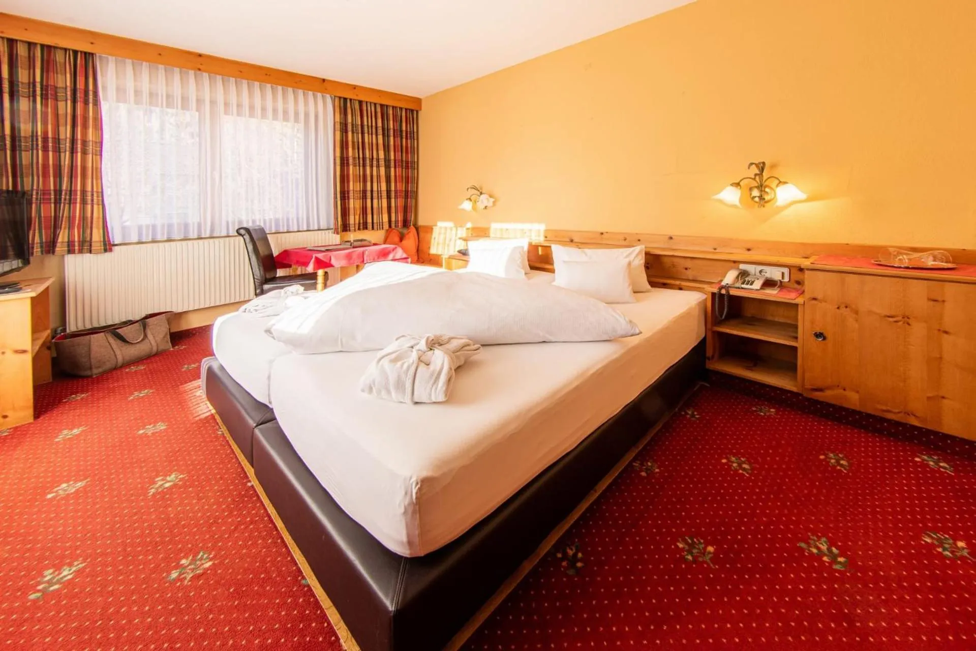 Bed in Hotel Riederhof- Urlaub mit WAU!