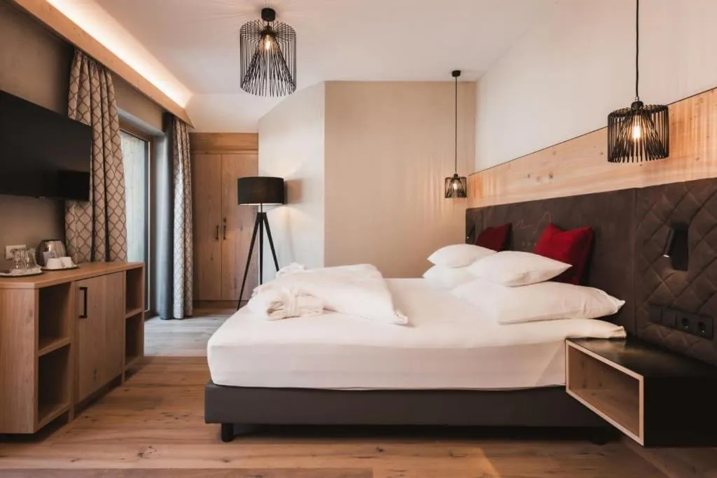 Bed in Hotel Riederhof- Urlaub mit WAU!