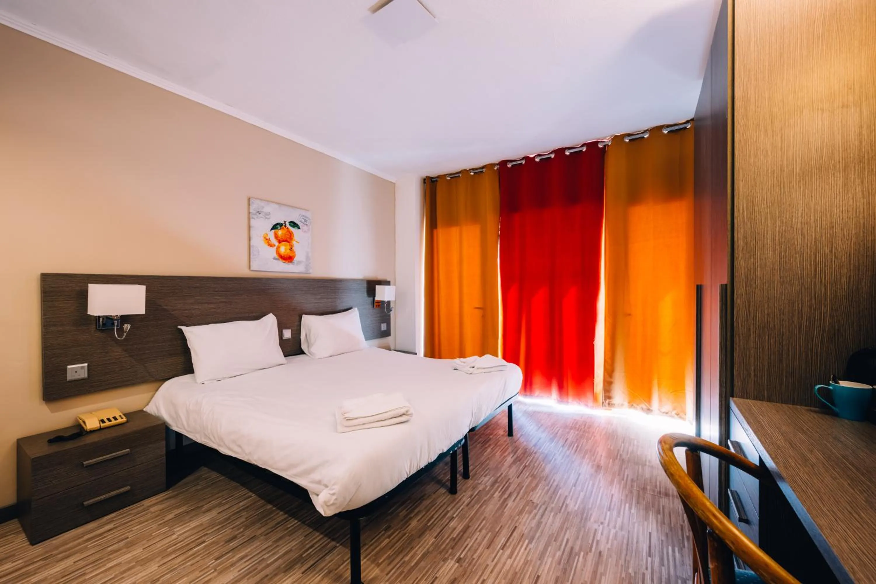 Bed in Primera Hotel