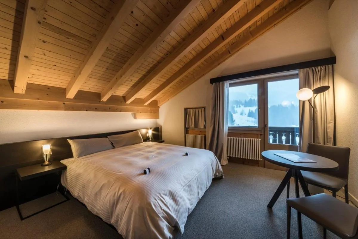 Bed in Hotel Maya Caprice