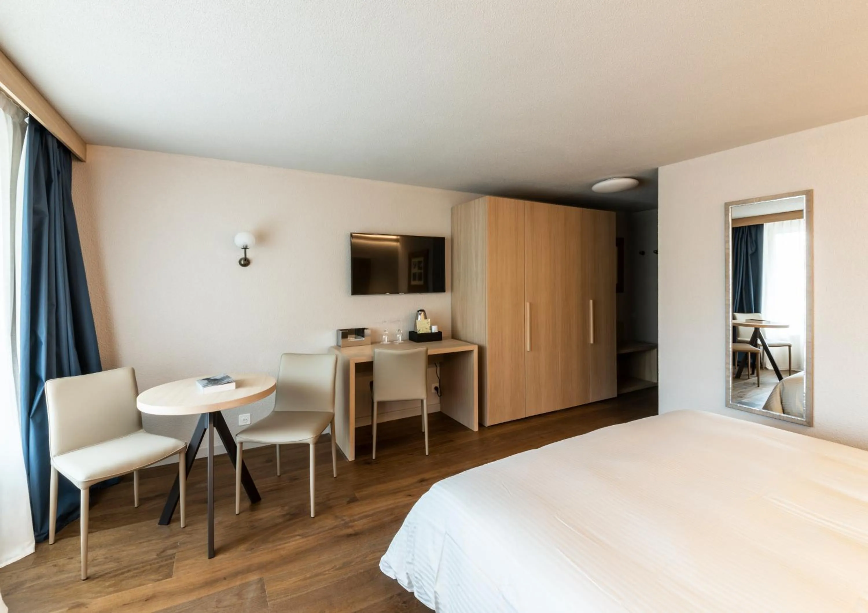 Bed in Hotel Maya Caprice