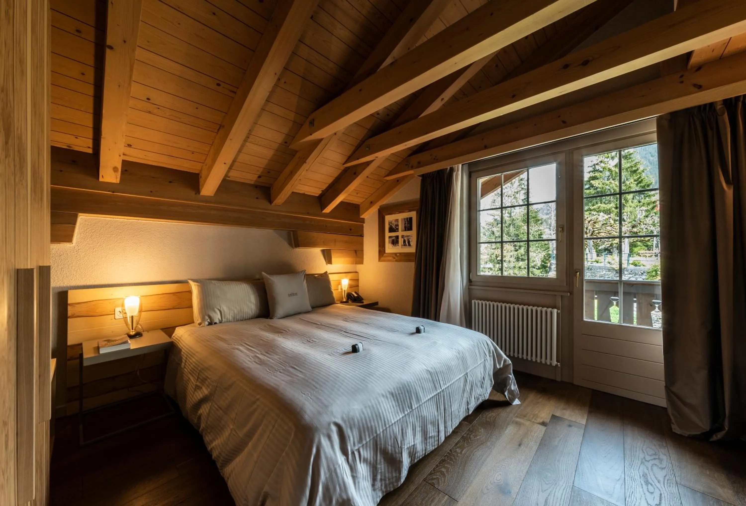 Bed in Hotel Maya Caprice