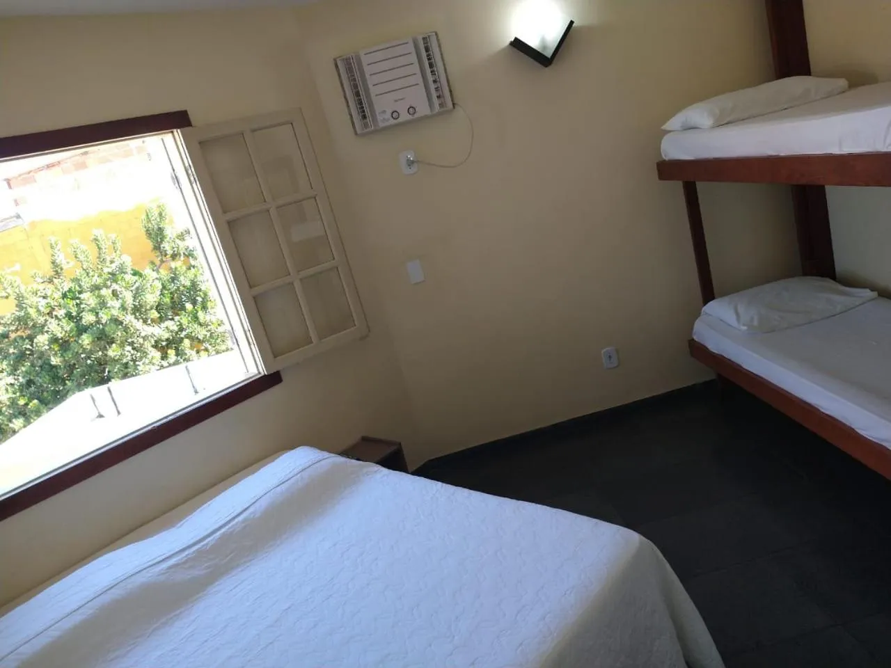 Bed in Pousada Genesis