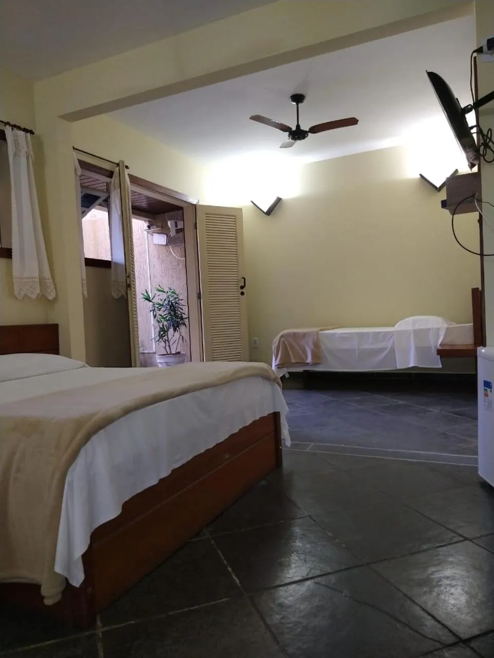 Bed in Pousada Genesis