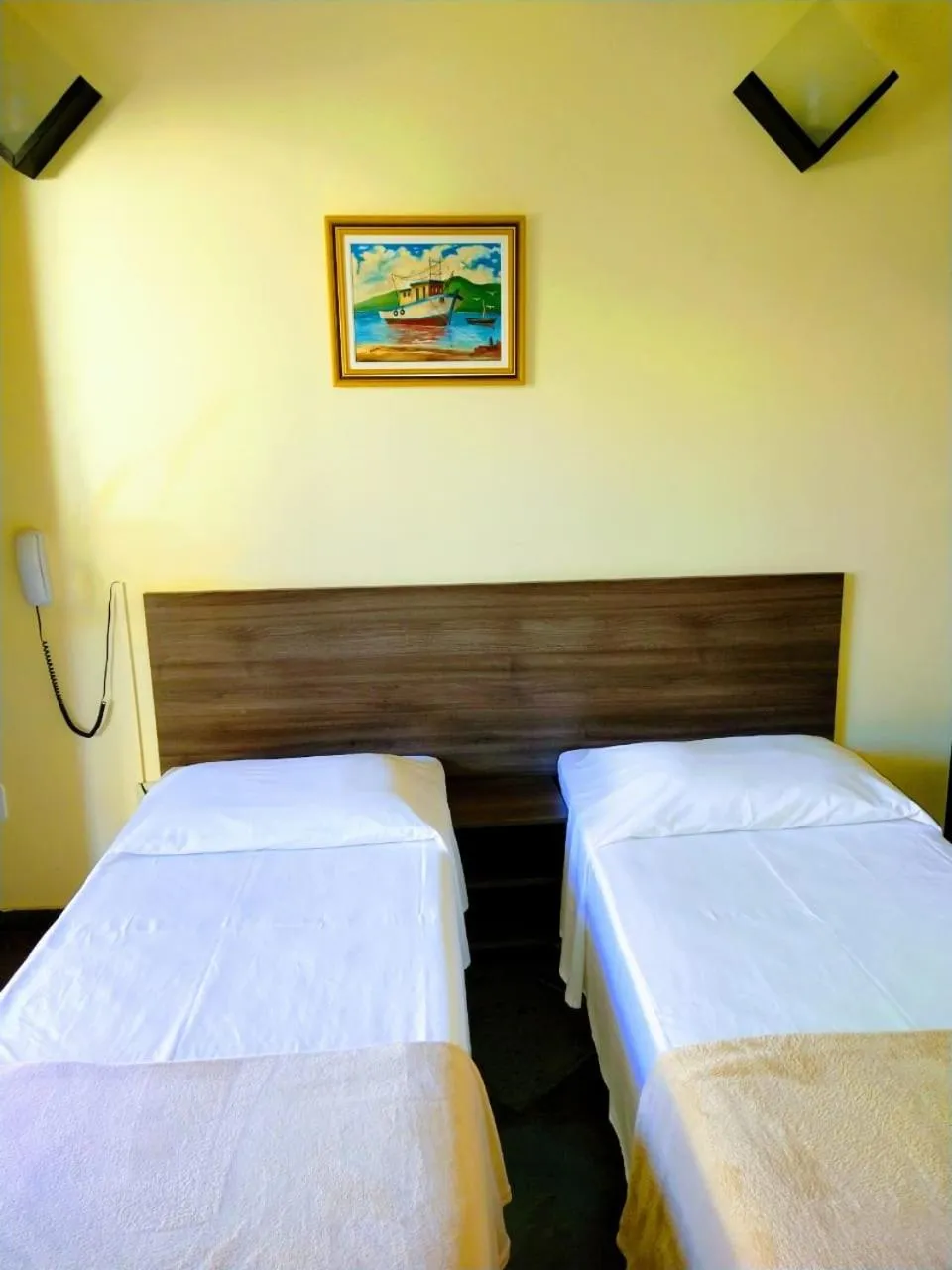 Bed in Pousada Genesis