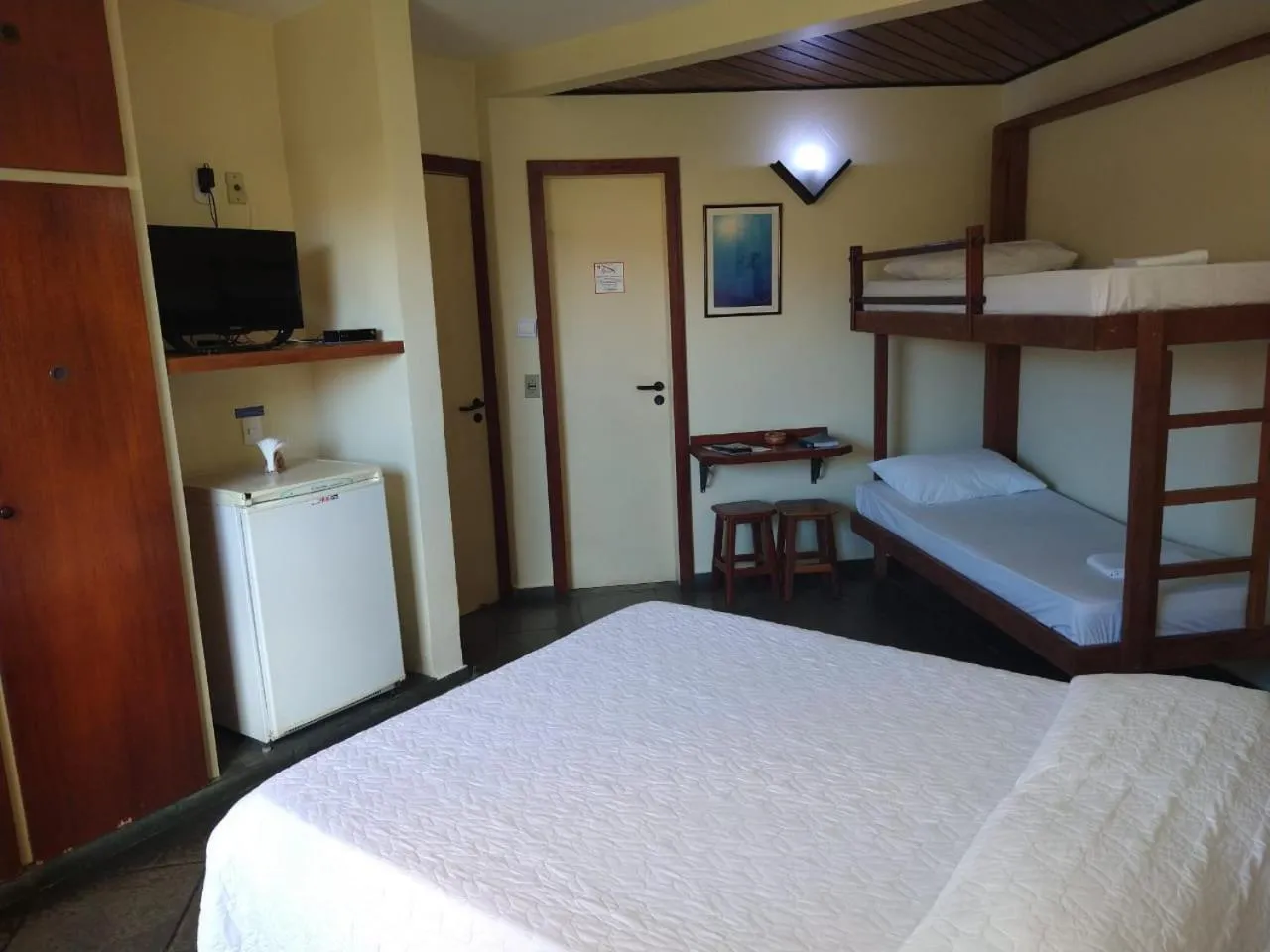 Bed in Pousada Genesis