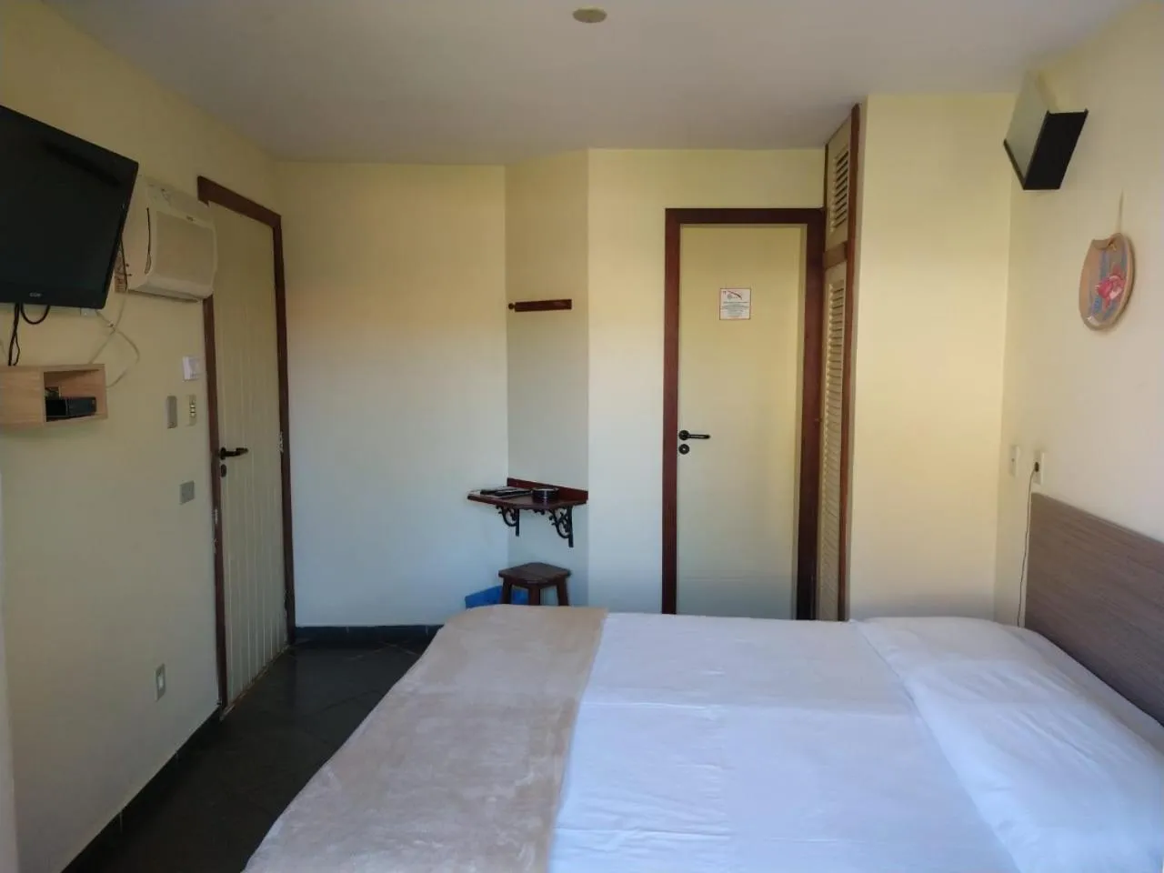 Bed in Pousada Genesis