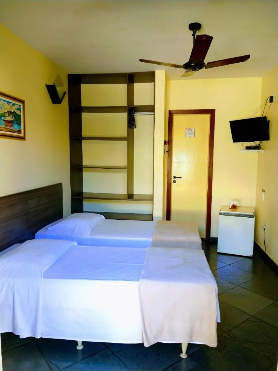 Bed in Pousada Genesis