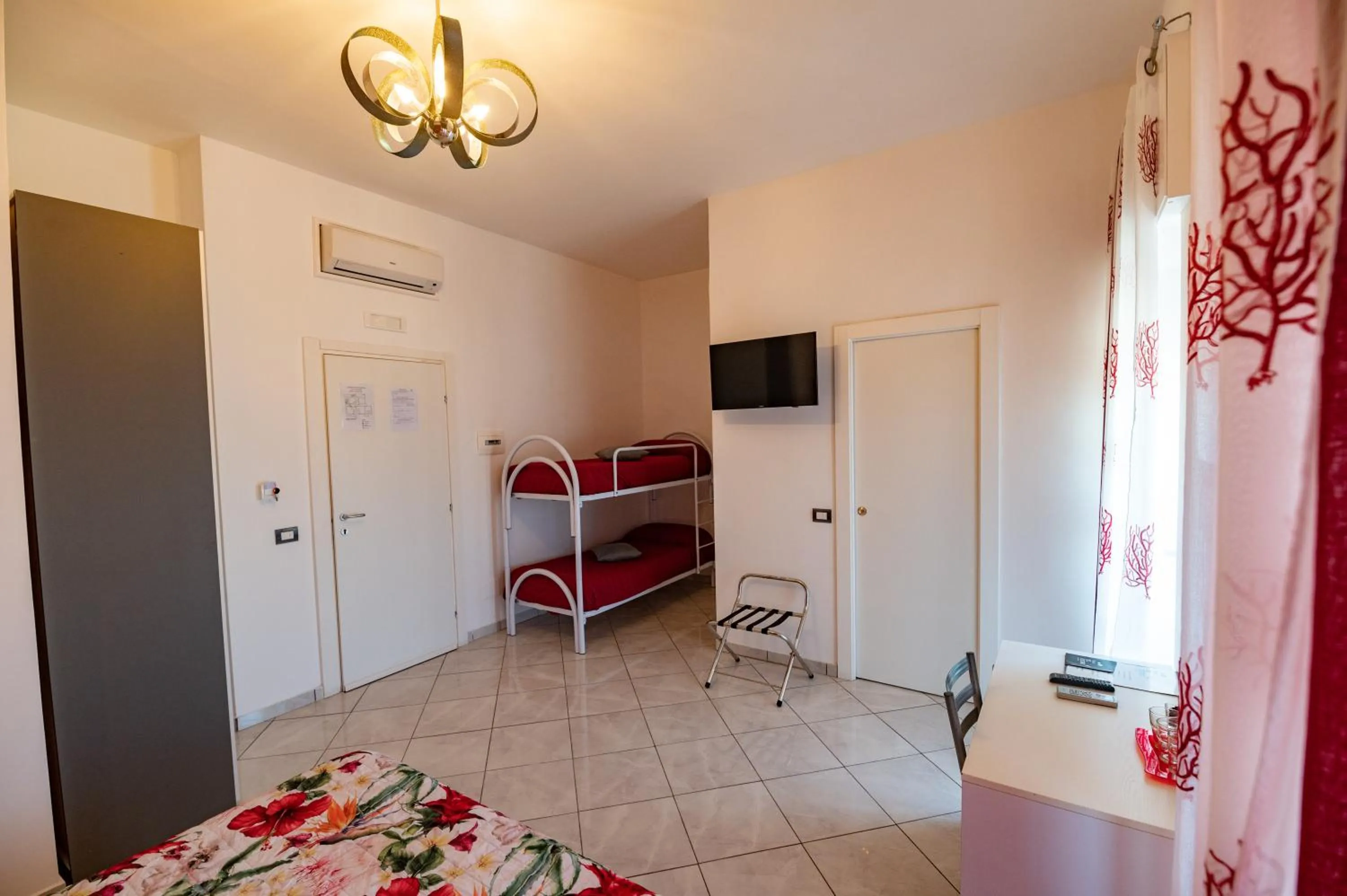 Bed in L'Isola Del Postino Rooms