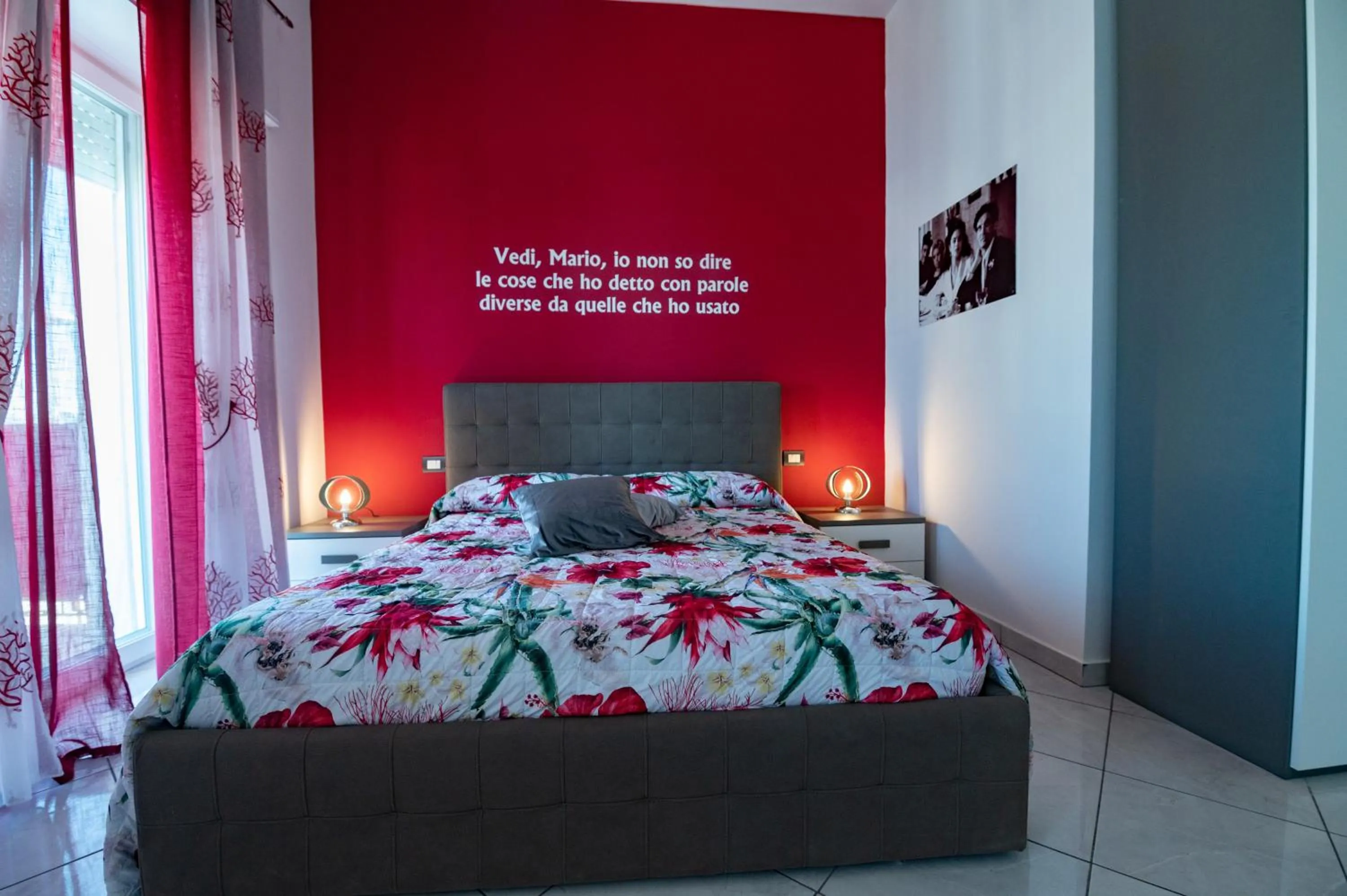 Bed in L'Isola Del Postino Rooms