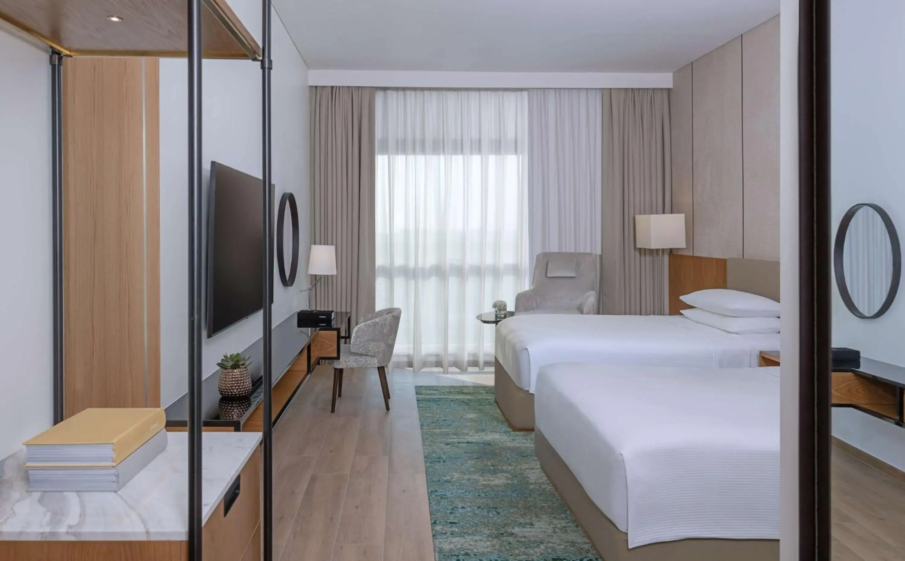 Twin Room with Pool View in Hyatt Regency Oryx Doha Twin Room with Pool View in Hyatt Regency Oryx Doha