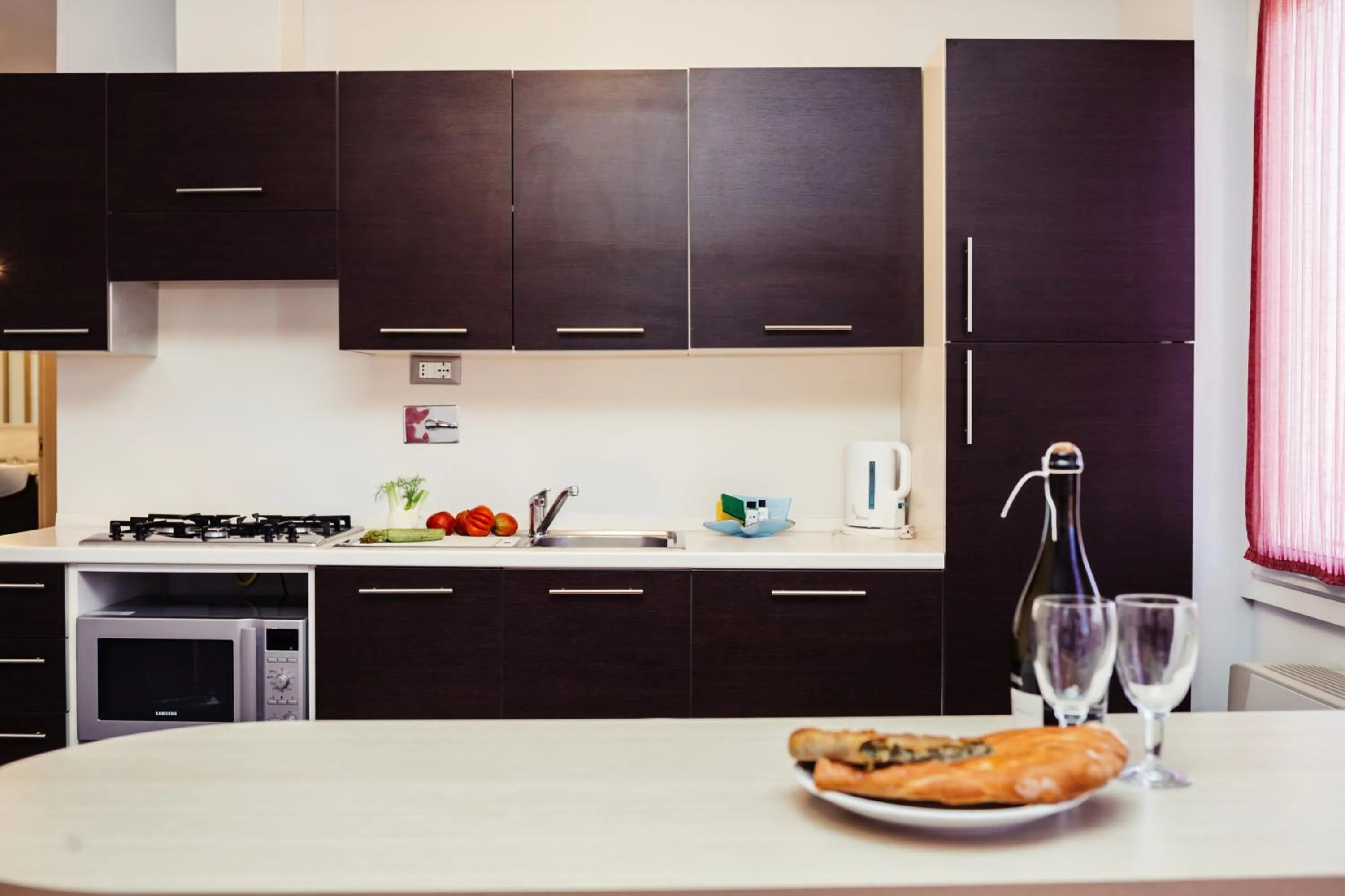 Kitchen or kitchenette in Residence Greco