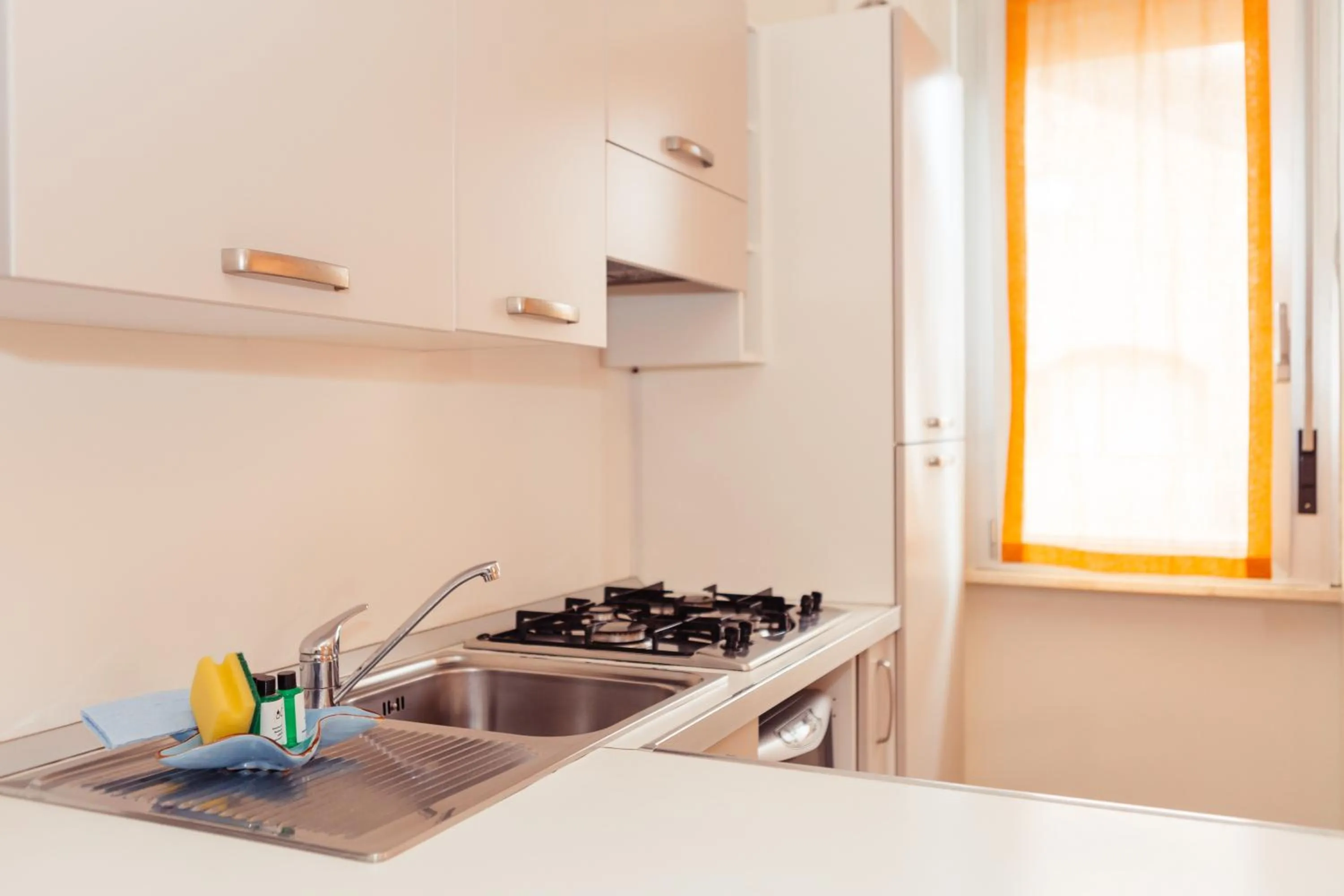 Kitchen or kitchenette in Residence Greco