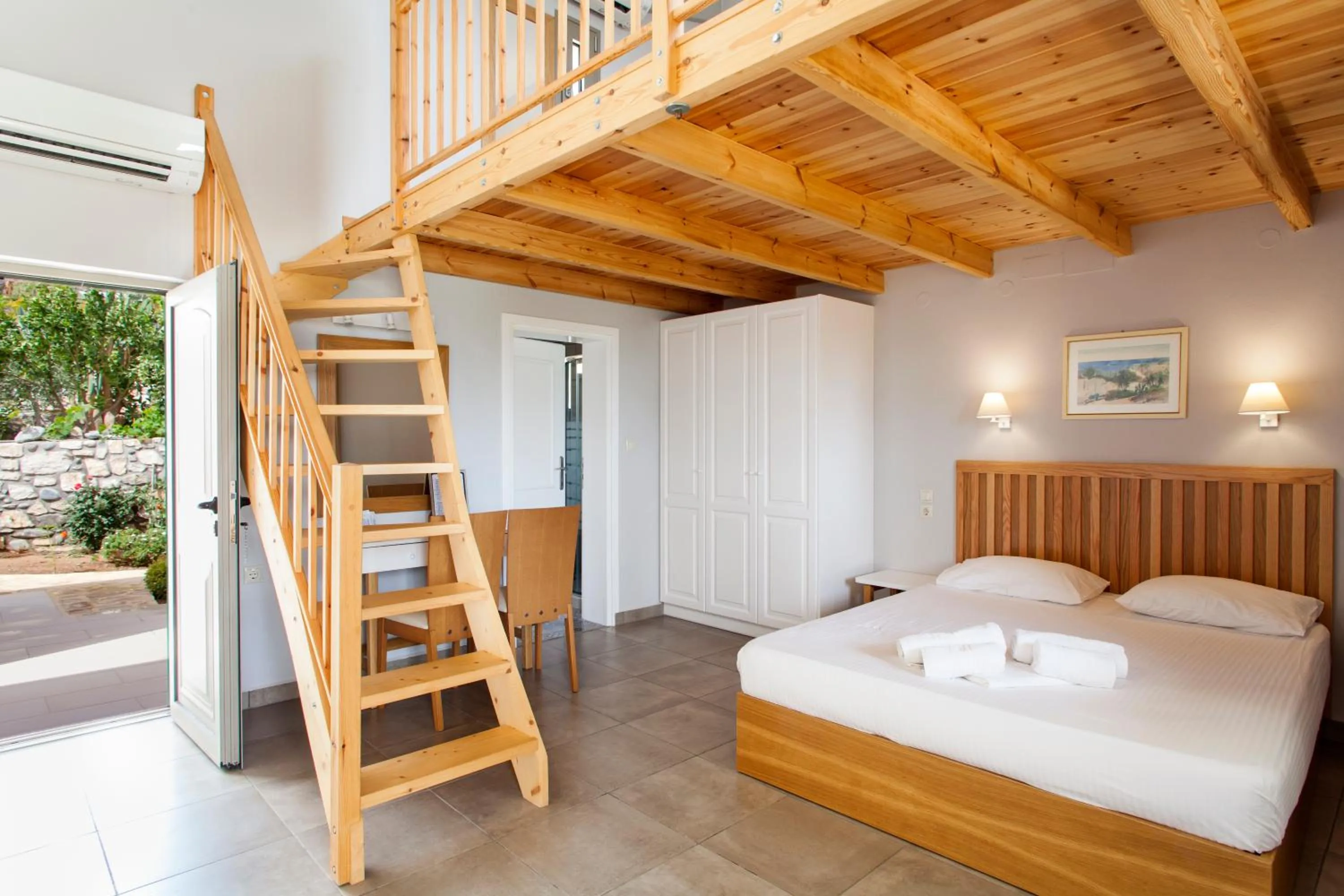 Bed in Mythos Suites Diskos