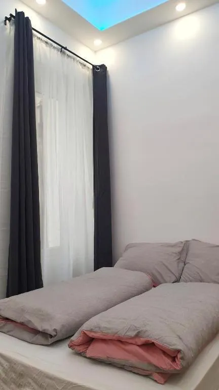Bed in Green Panda Apartments