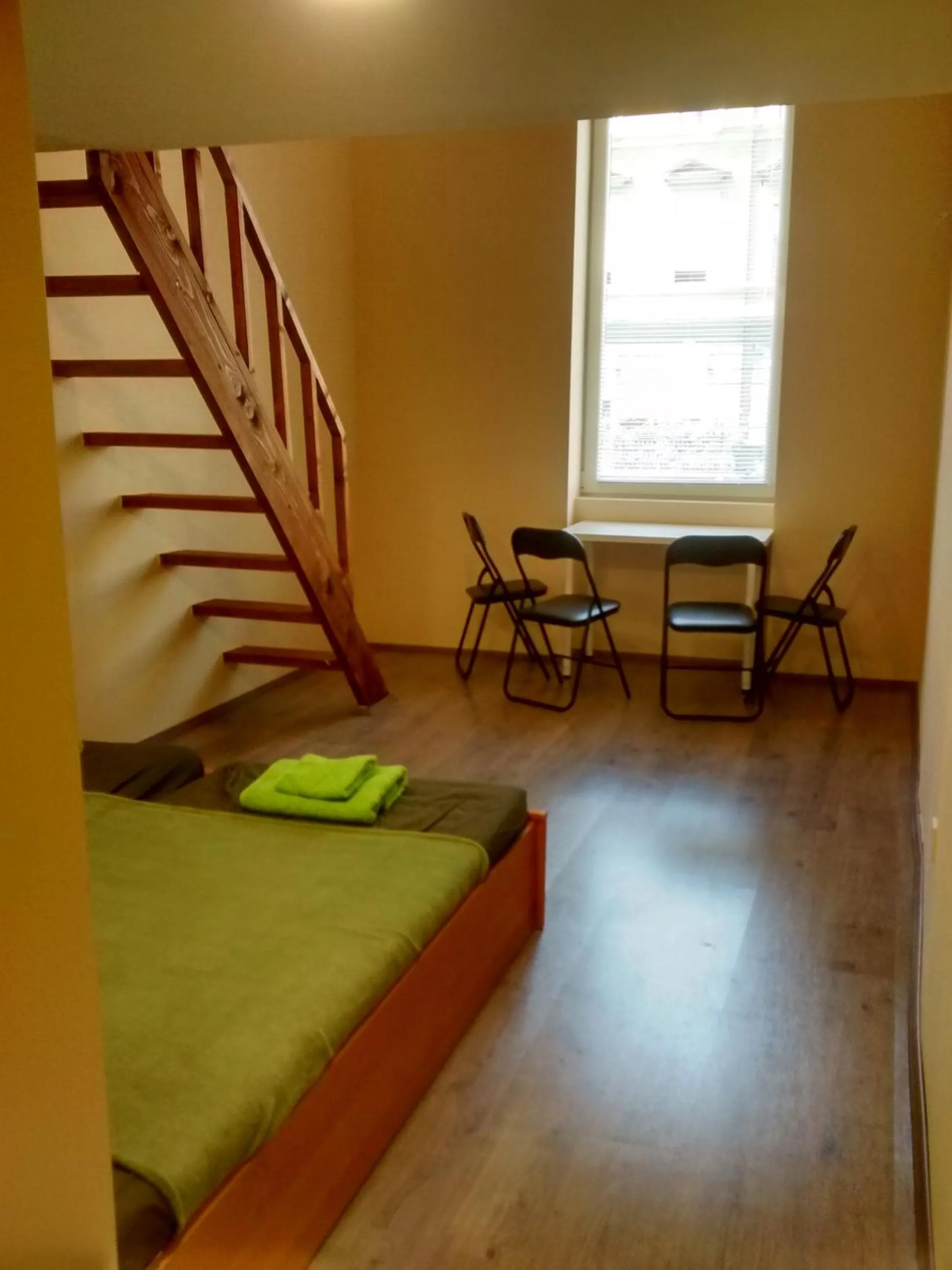 Bed in Green Panda Apartments