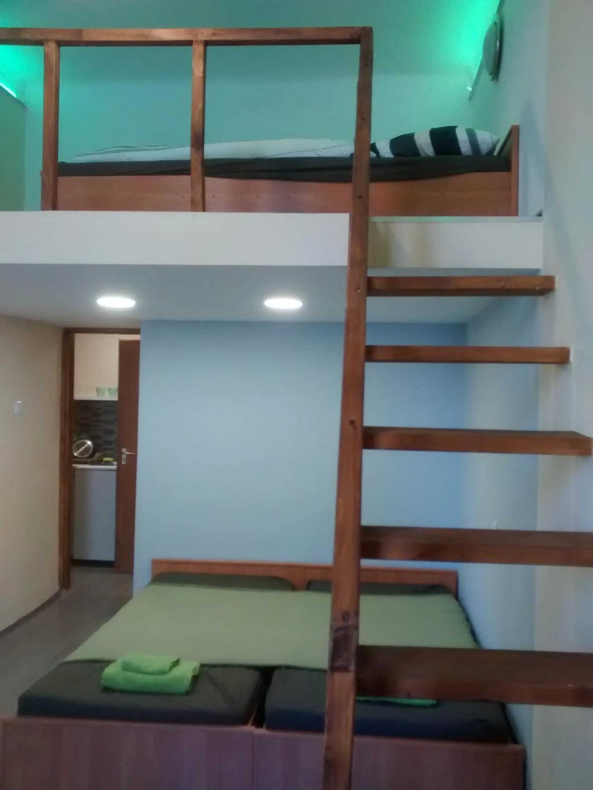 Bed in Green Panda Apartments