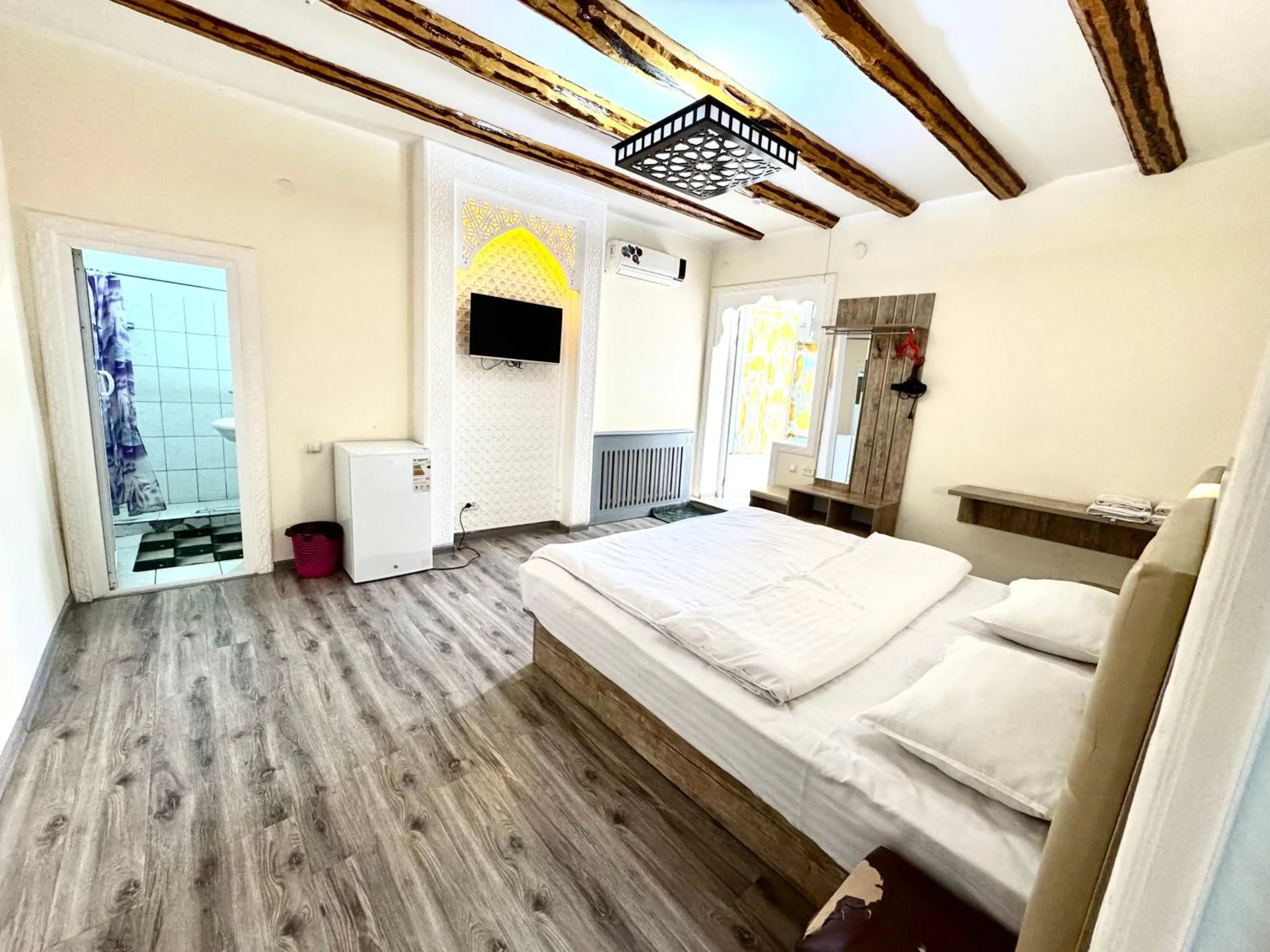 Living room, Bed in Bukhara house hotel