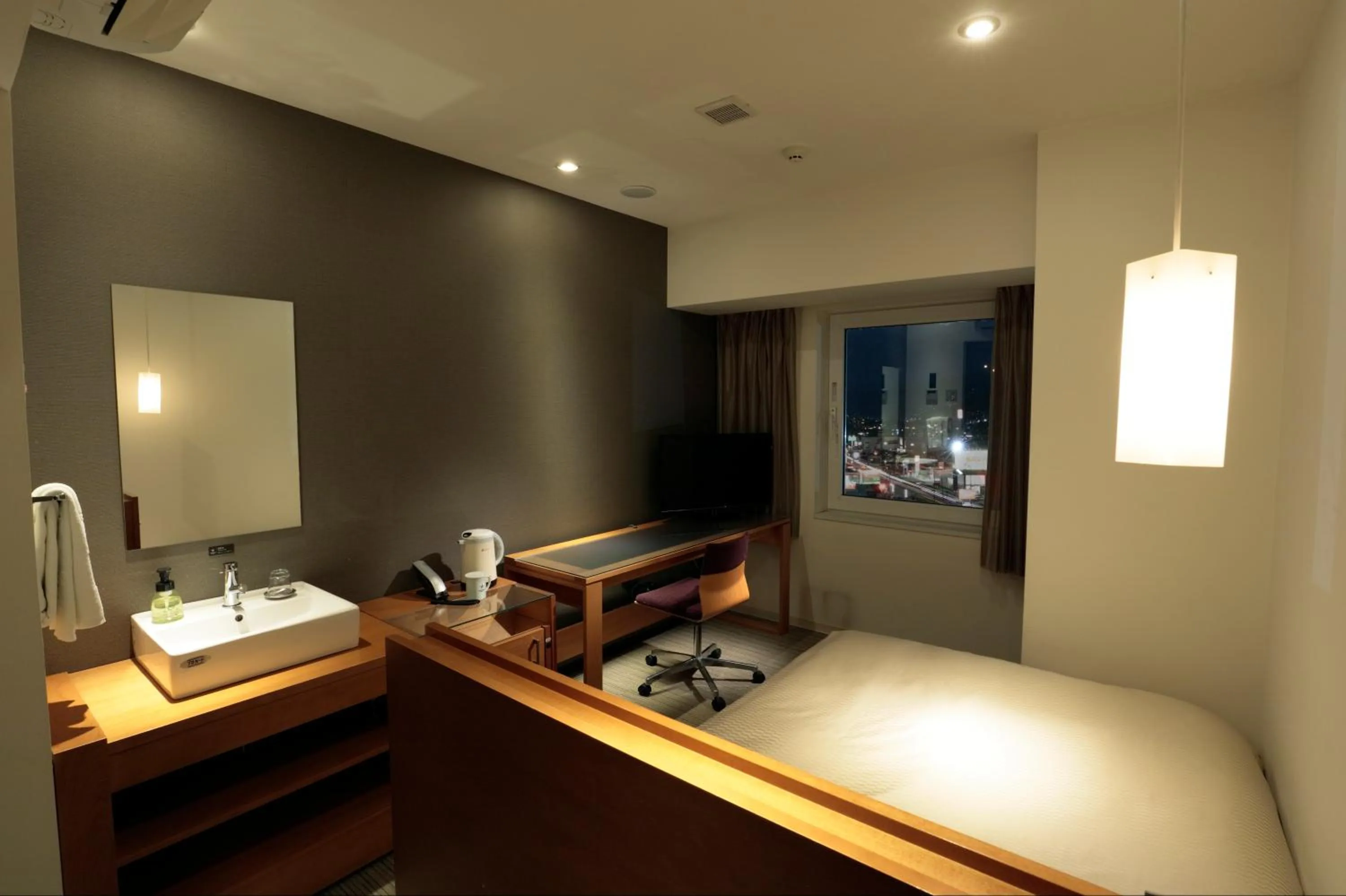 Bed in Candeo Hotels Chino