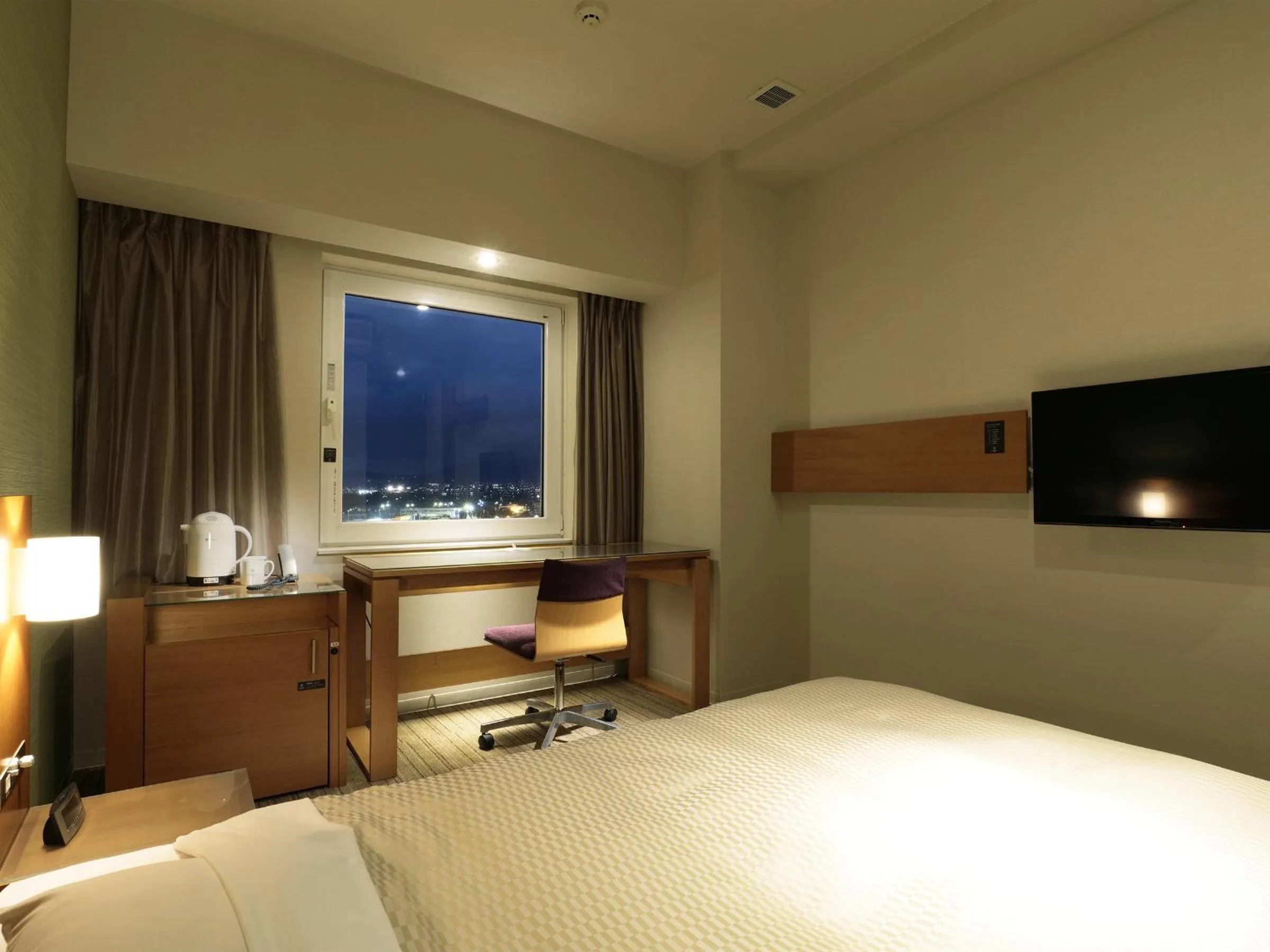 Bed in Candeo Hotels Chino