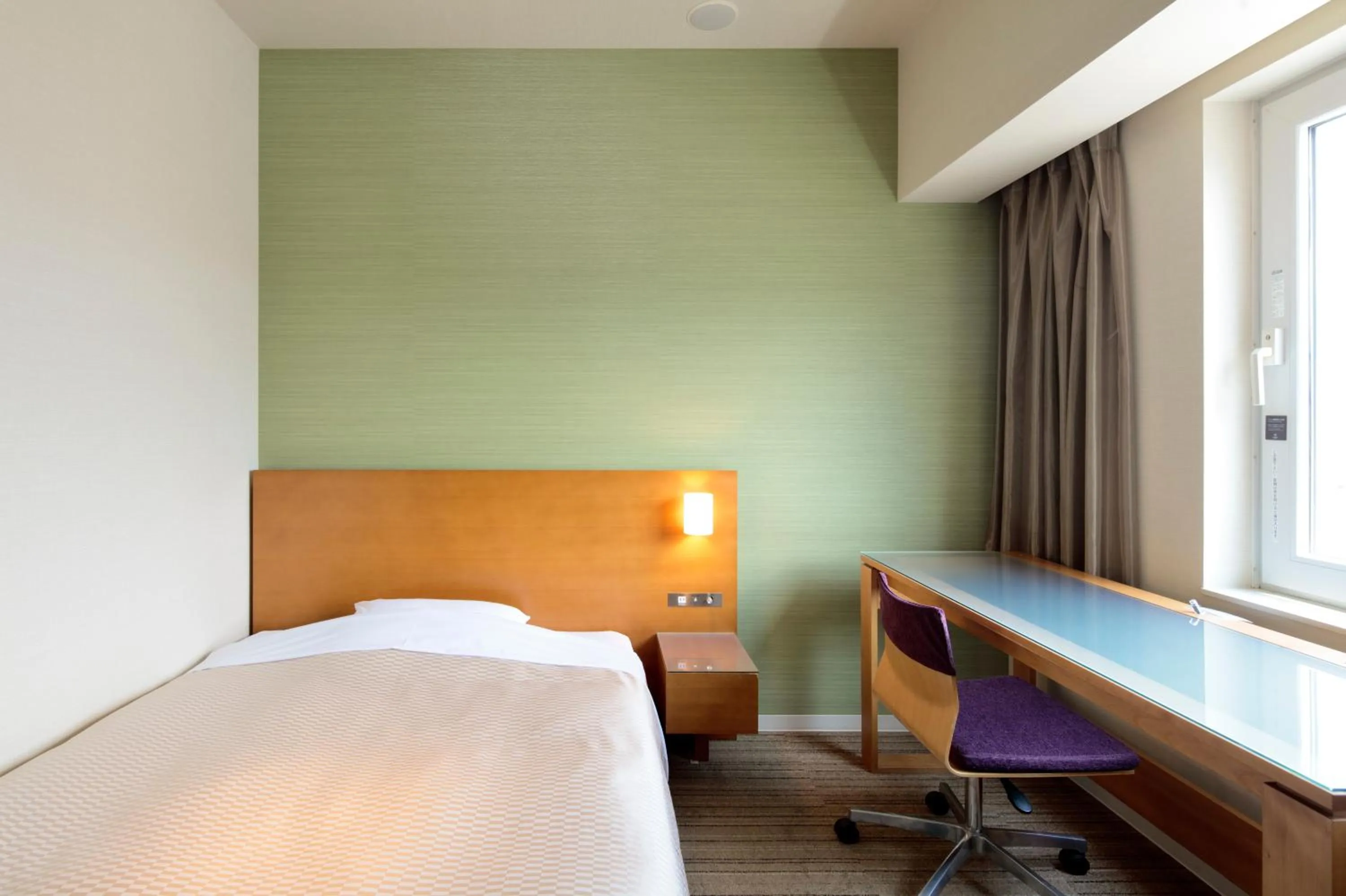 Bed in Candeo Hotels Chino