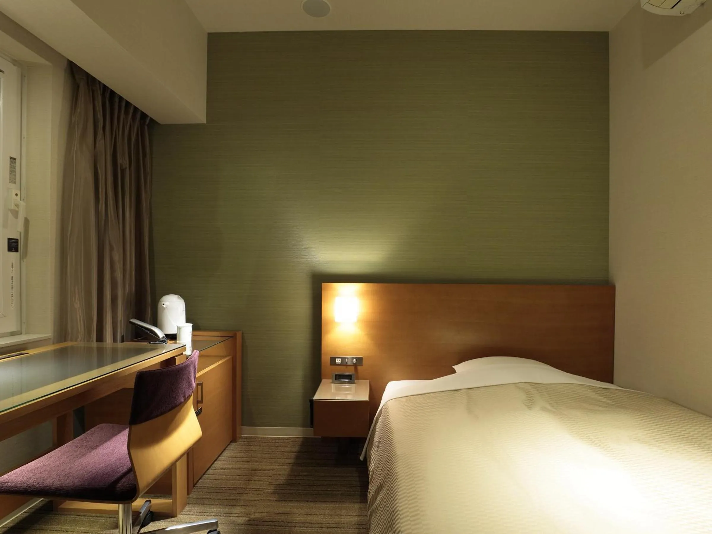 Bed in Candeo Hotels Chino