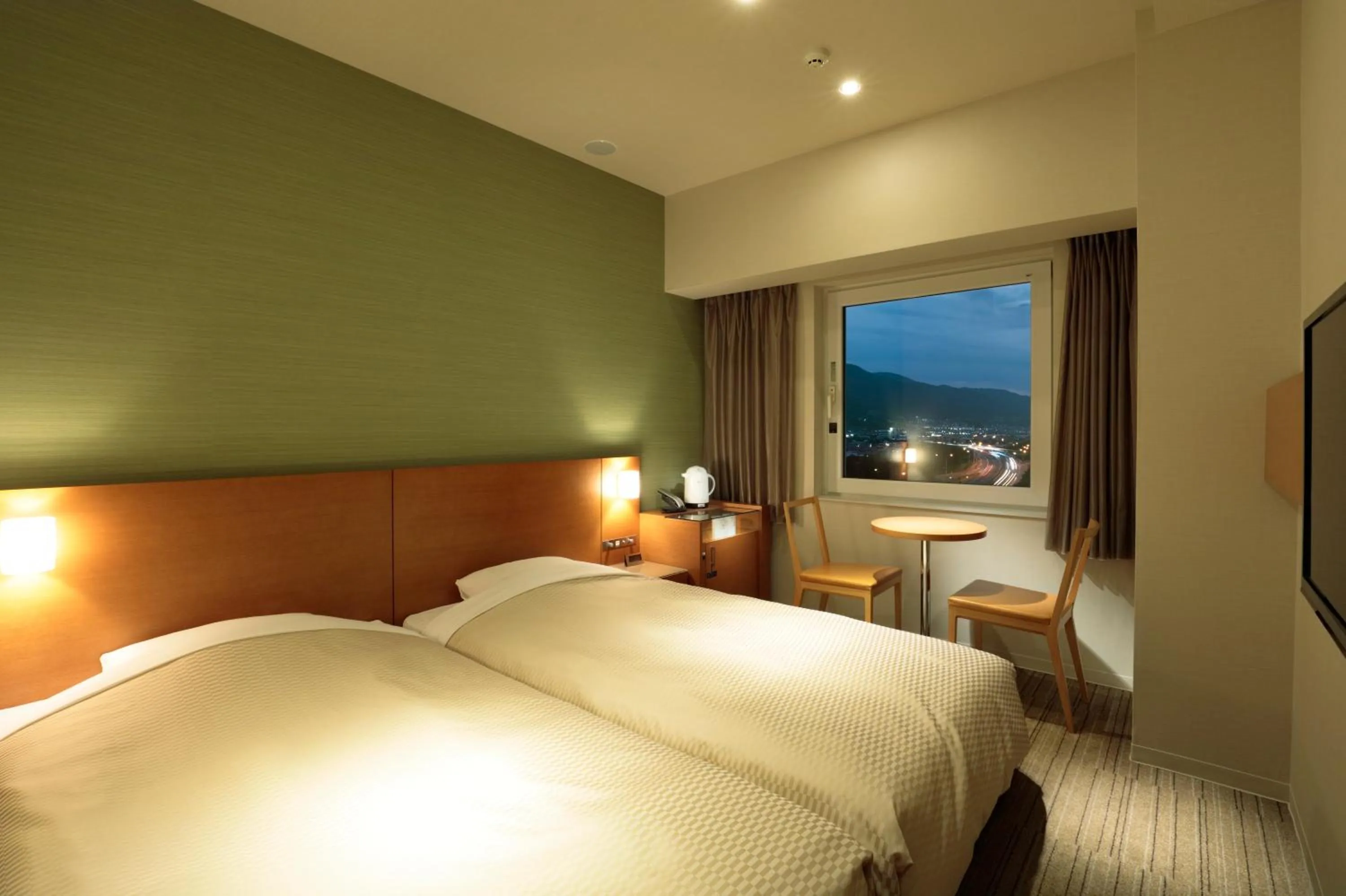 Bed in Candeo Hotels Chino