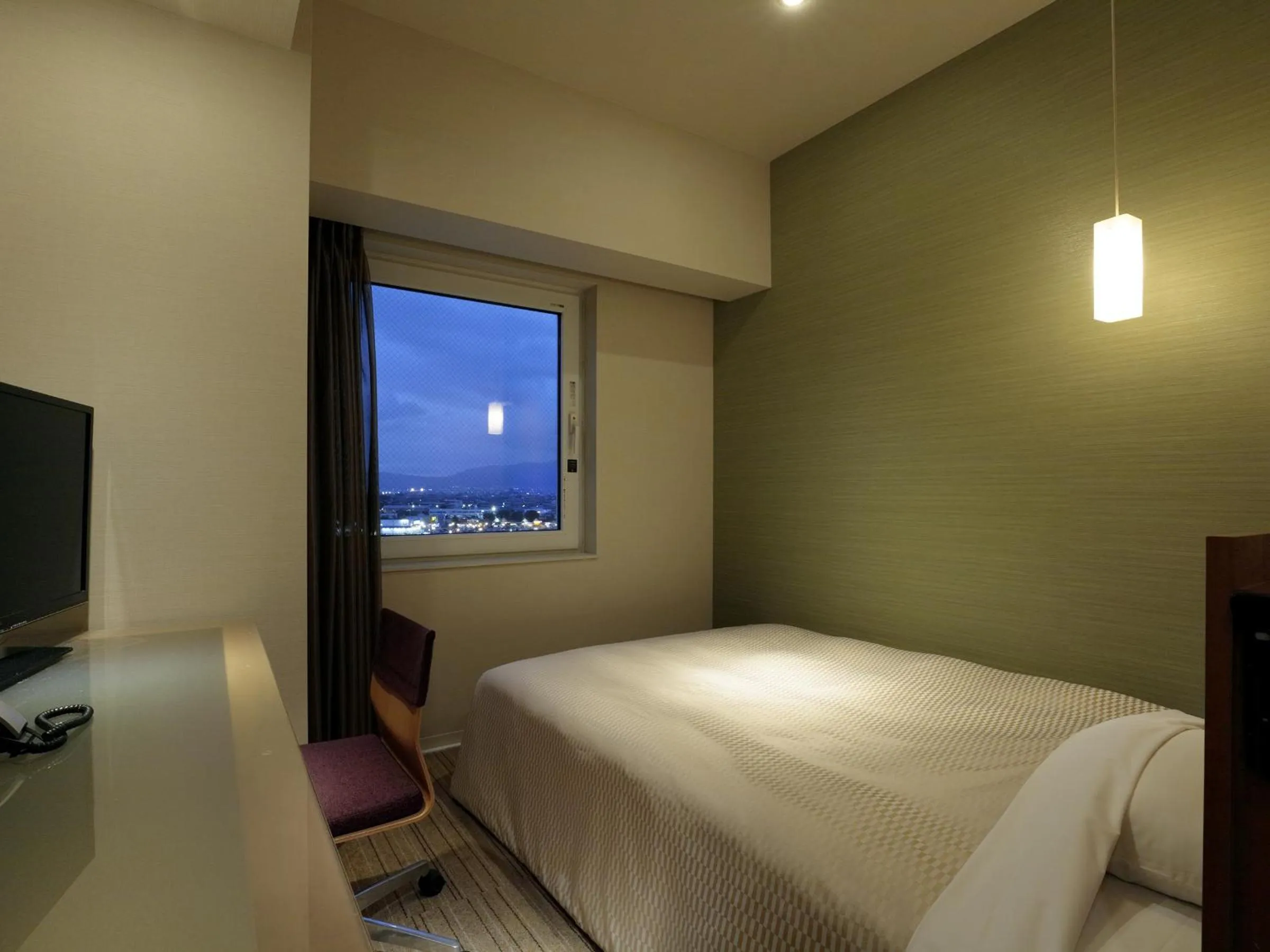 Bed in Candeo Hotels Chino