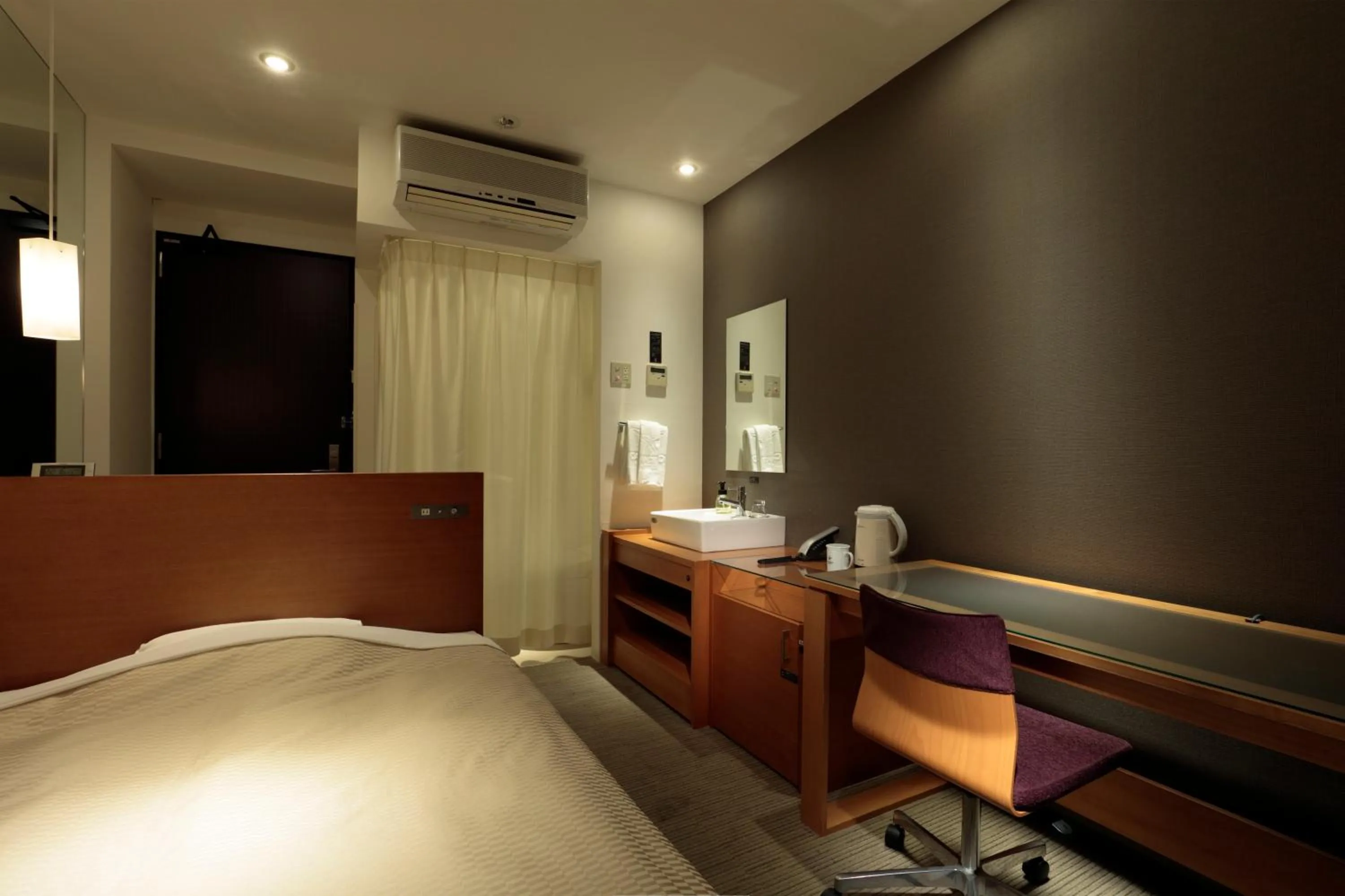 Bed in Candeo Hotels Chino