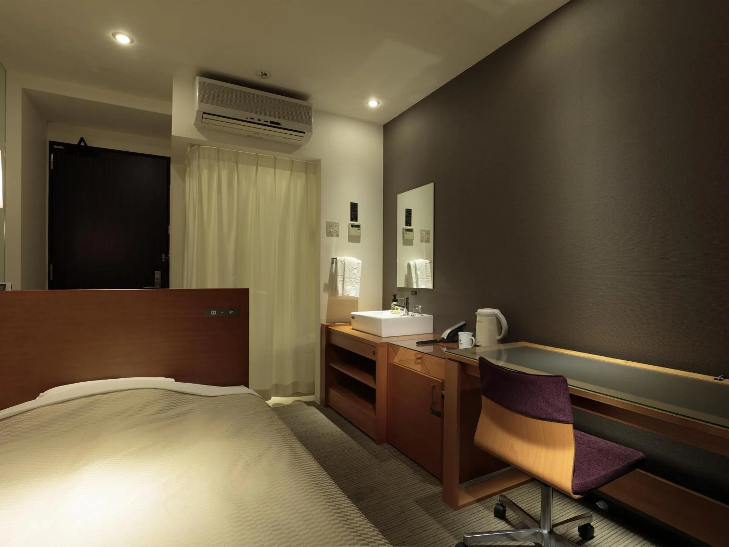 Bed in Candeo Hotels Chino