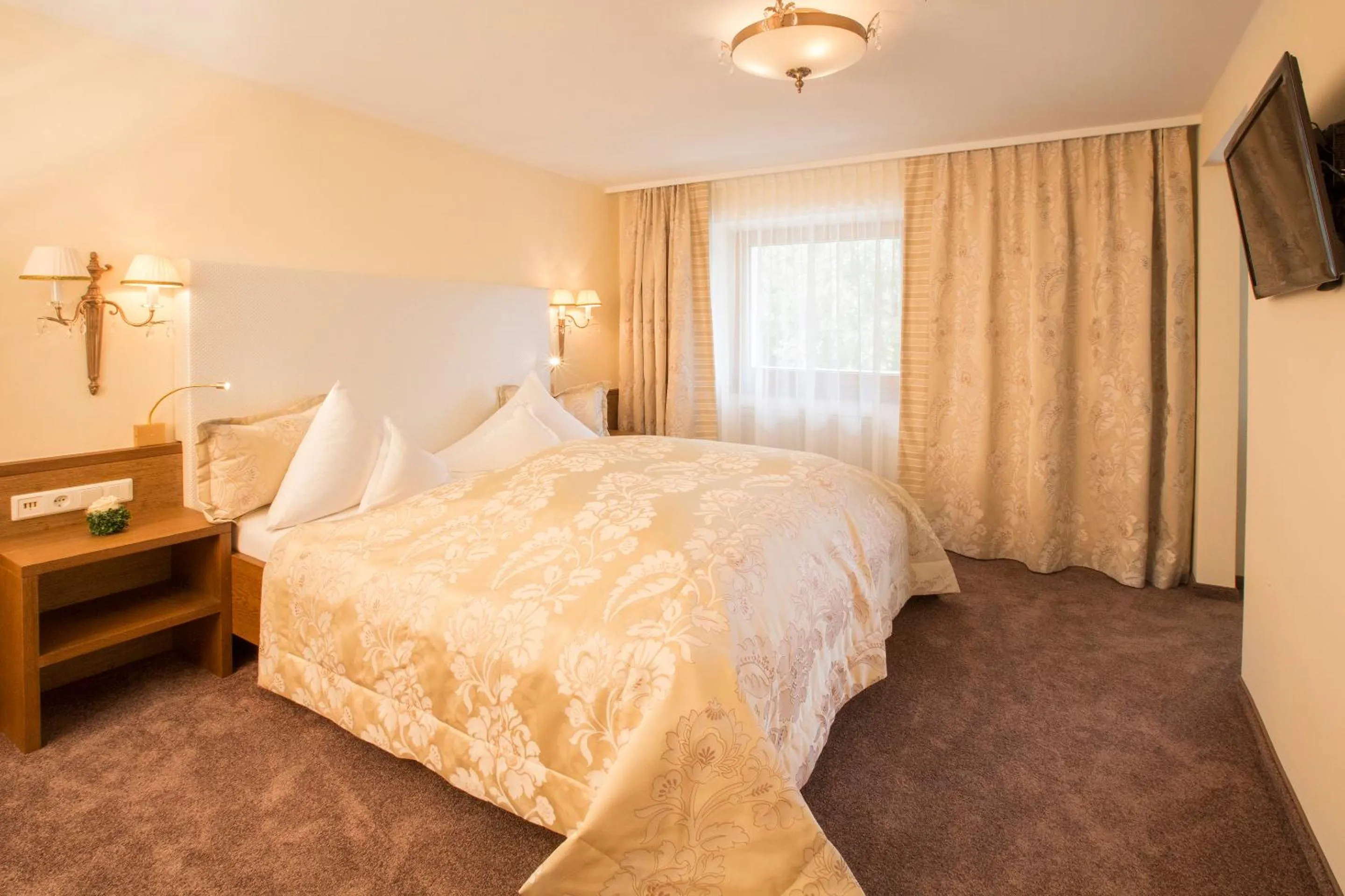 Bed in Superior Hotel Post Ischgl