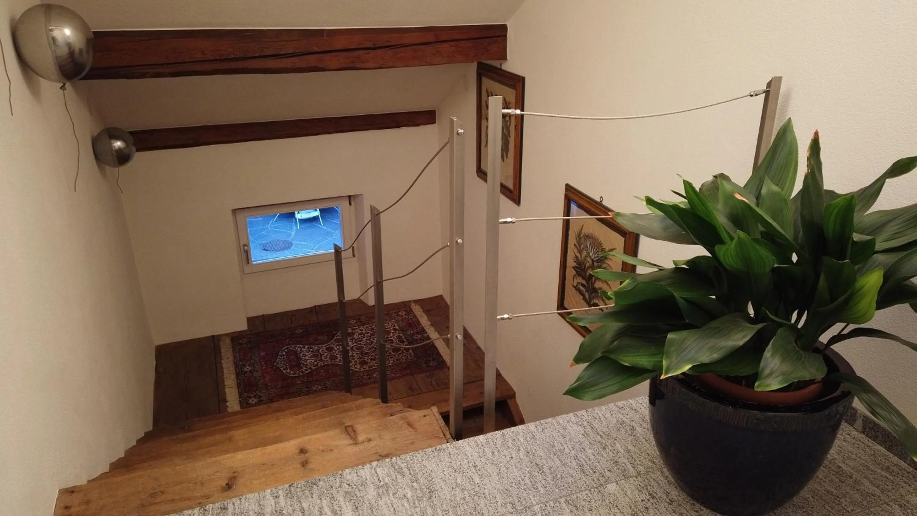 Communal lounge/ TV room, Bed in Hotel Soazza