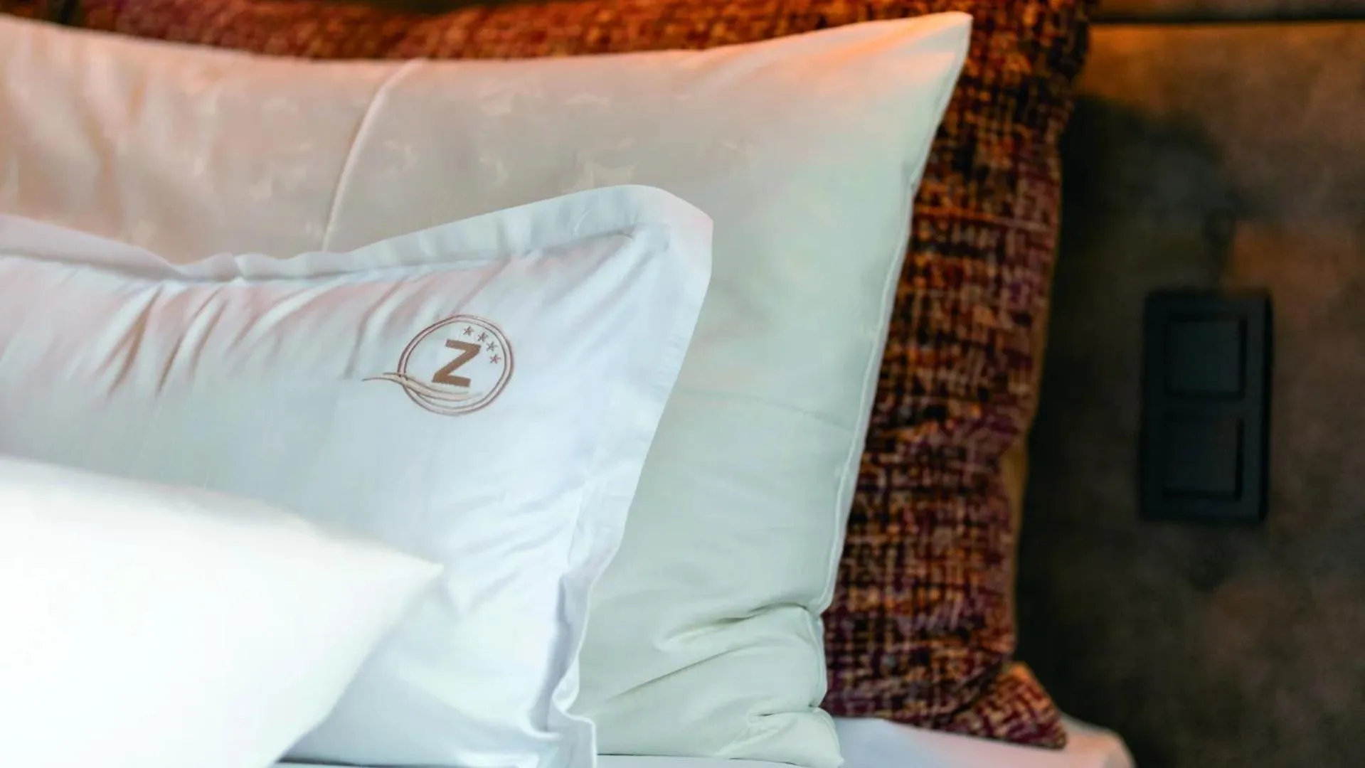 Bed in ZillergrundRock Luxury Mountain Resort