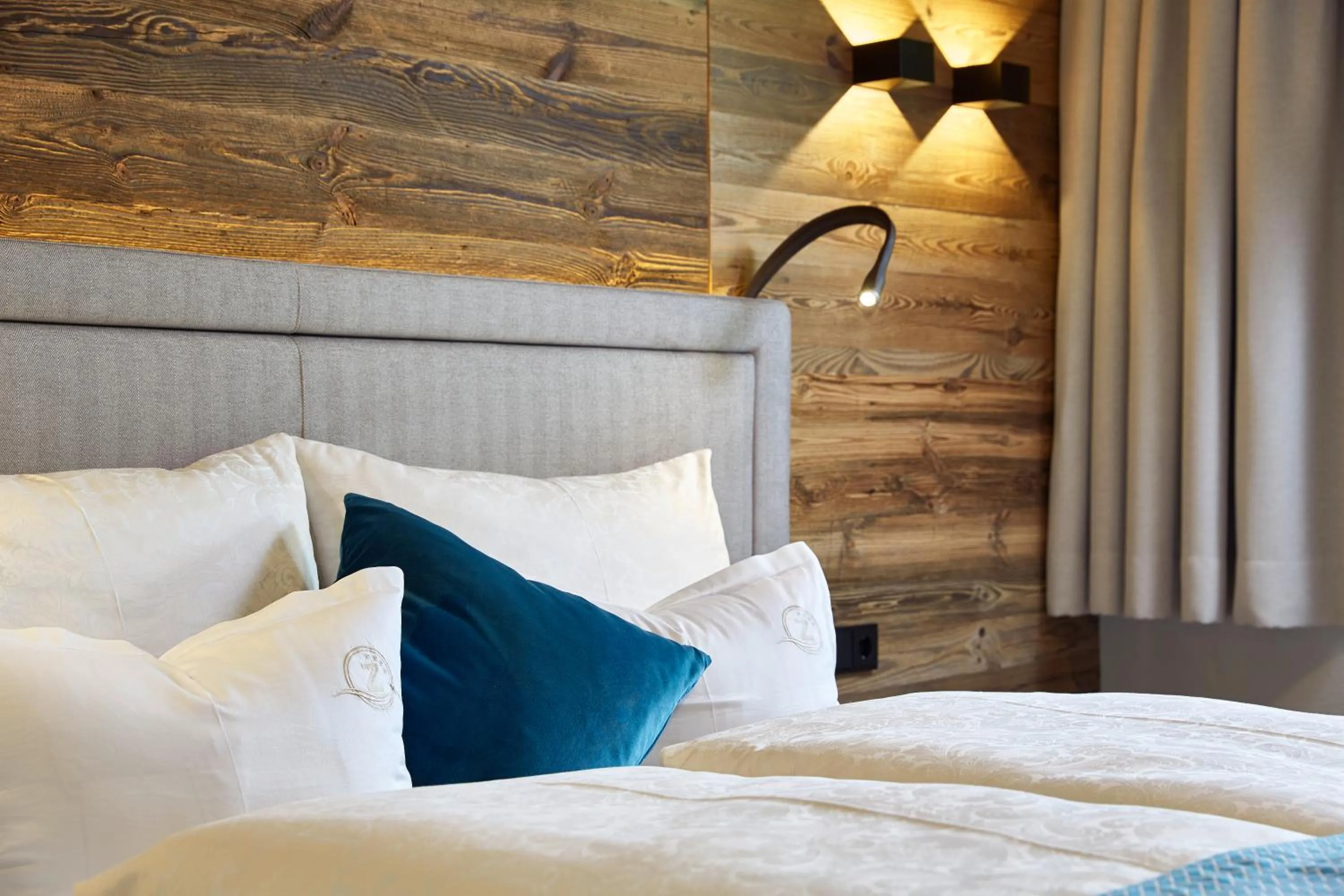 Bed in ZillergrundRock Luxury Mountain Resort