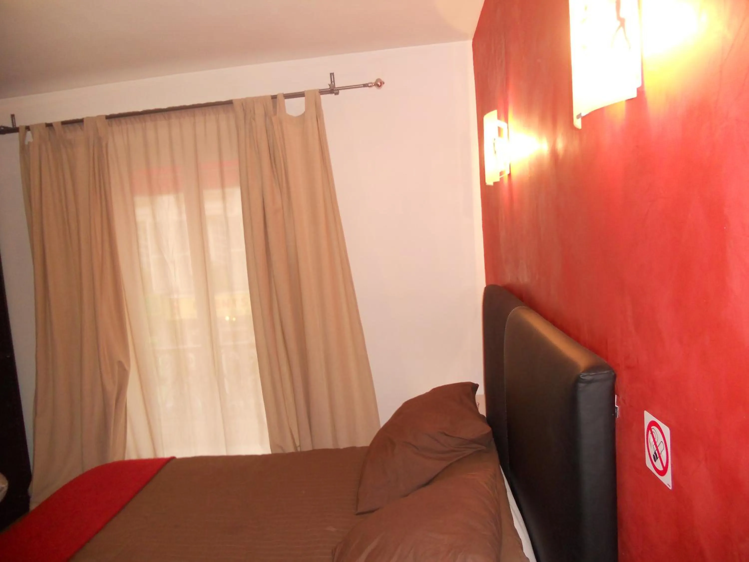 Bed in Hotel Pacific