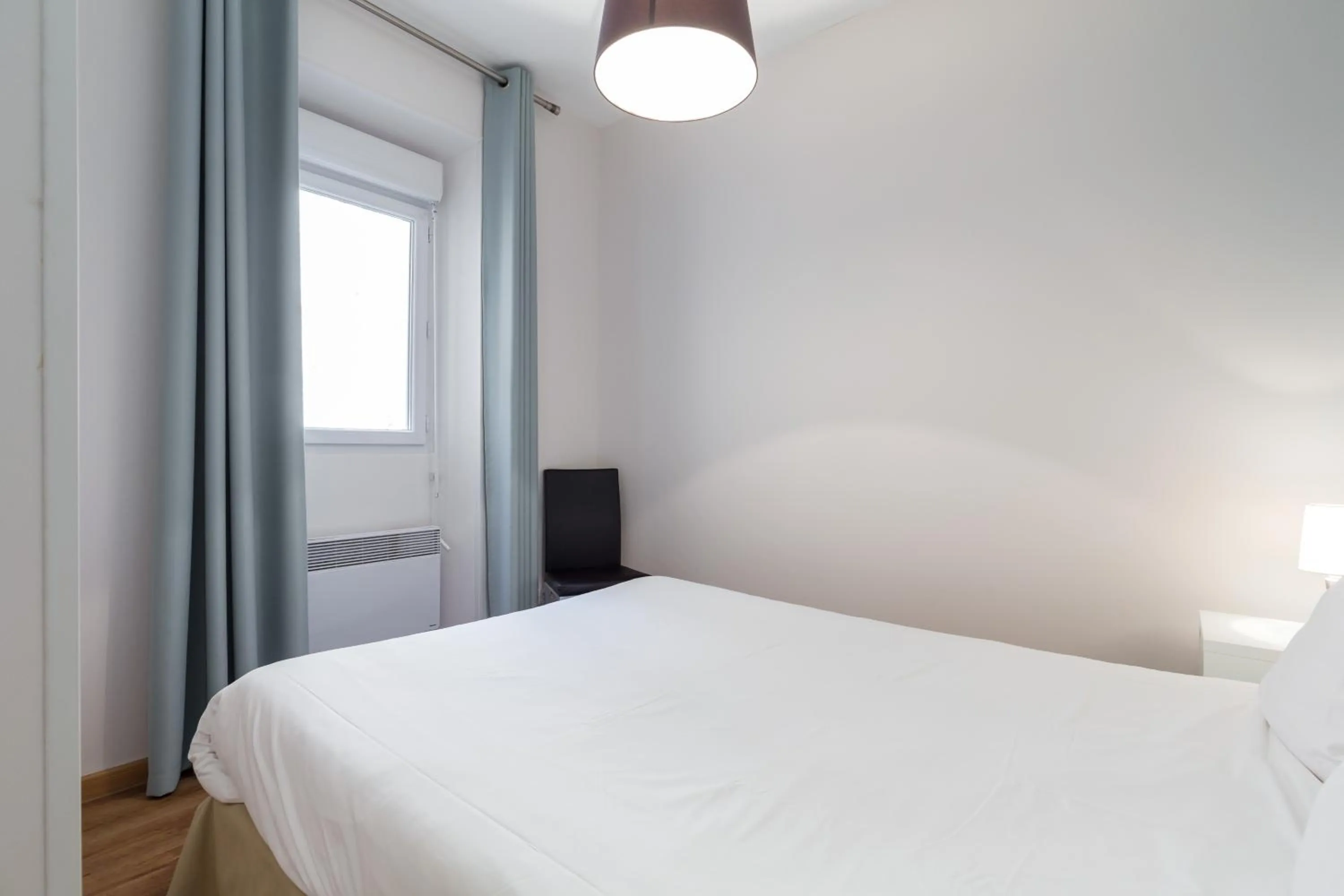 Bedroom, Bed in Florella Clemenceau Apartment