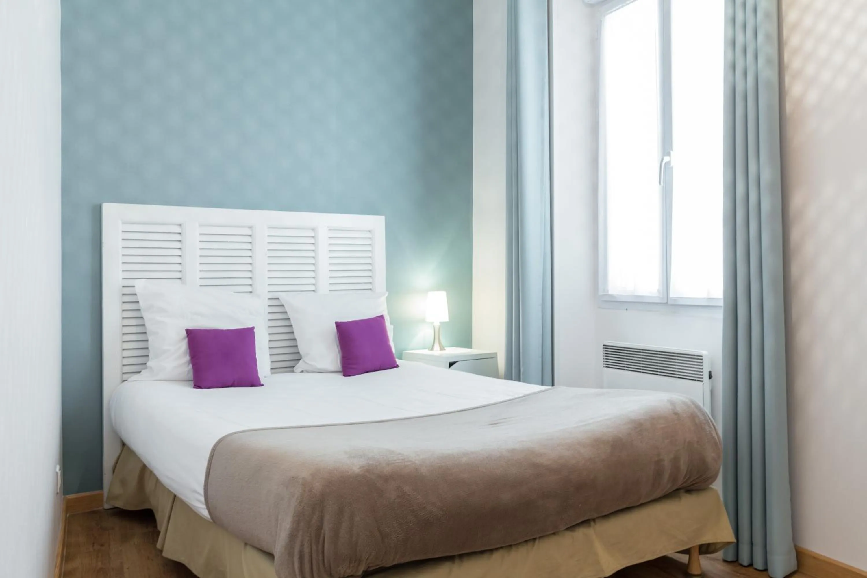 Bedroom, Bed in Florella Clemenceau Apartment