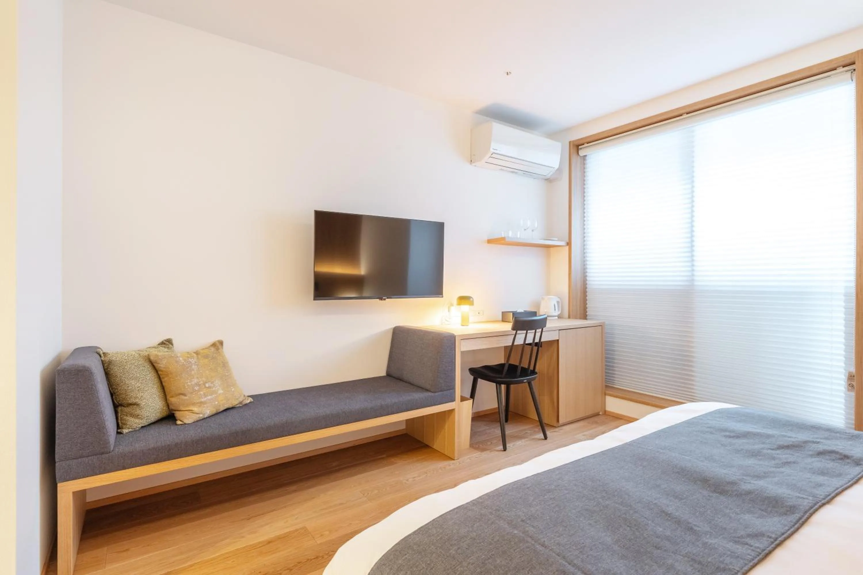 Bed in Karasuma Rokujo Hotel