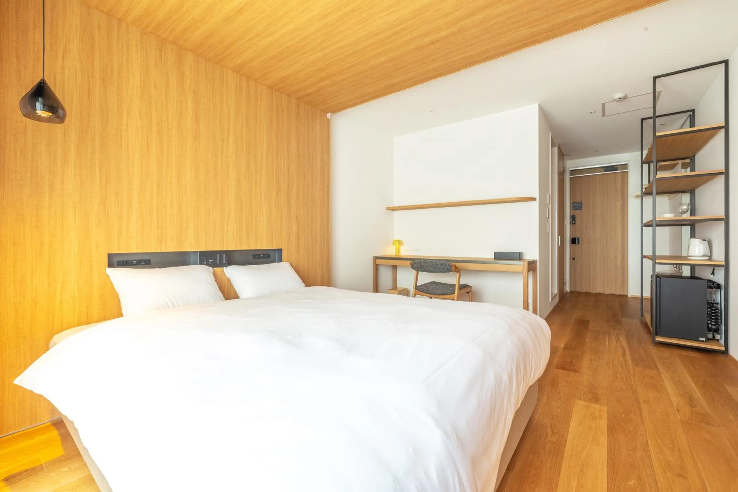 Bed in Karasuma Rokujo Hotel