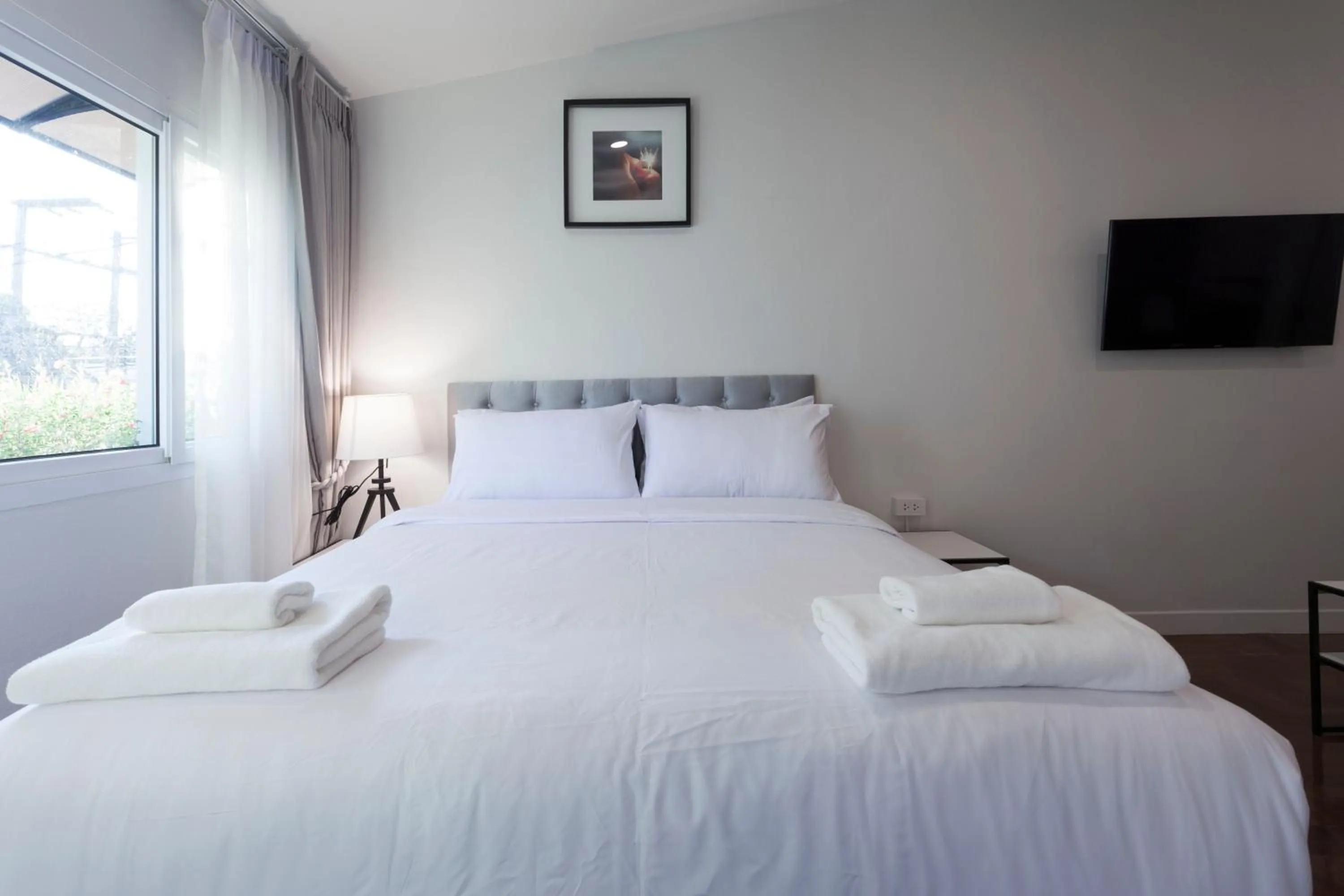 Photo of the whole room, Bed in Cozy Home by Nan