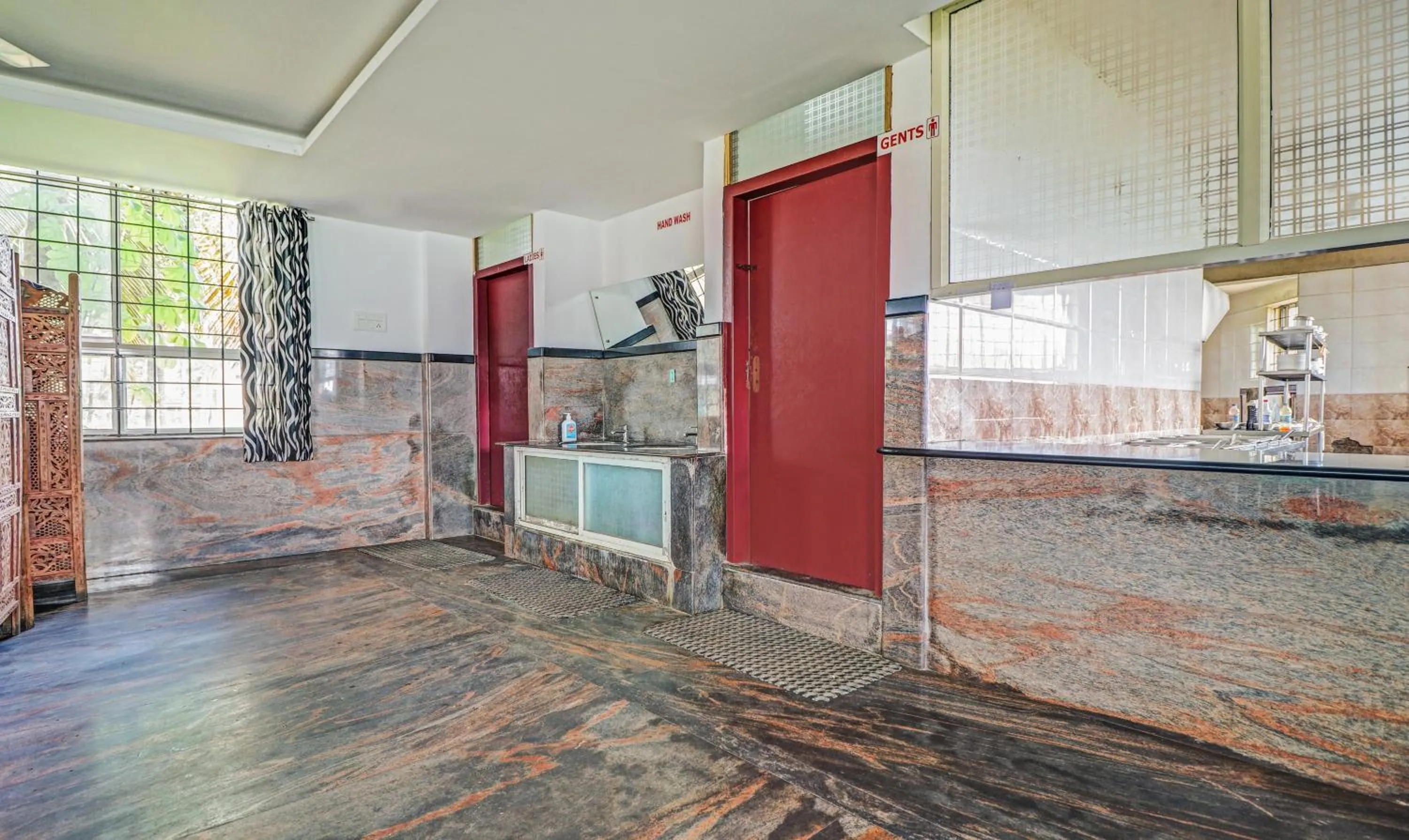 Kitchen or kitchenette in Treebo Green Land Kushalnagar