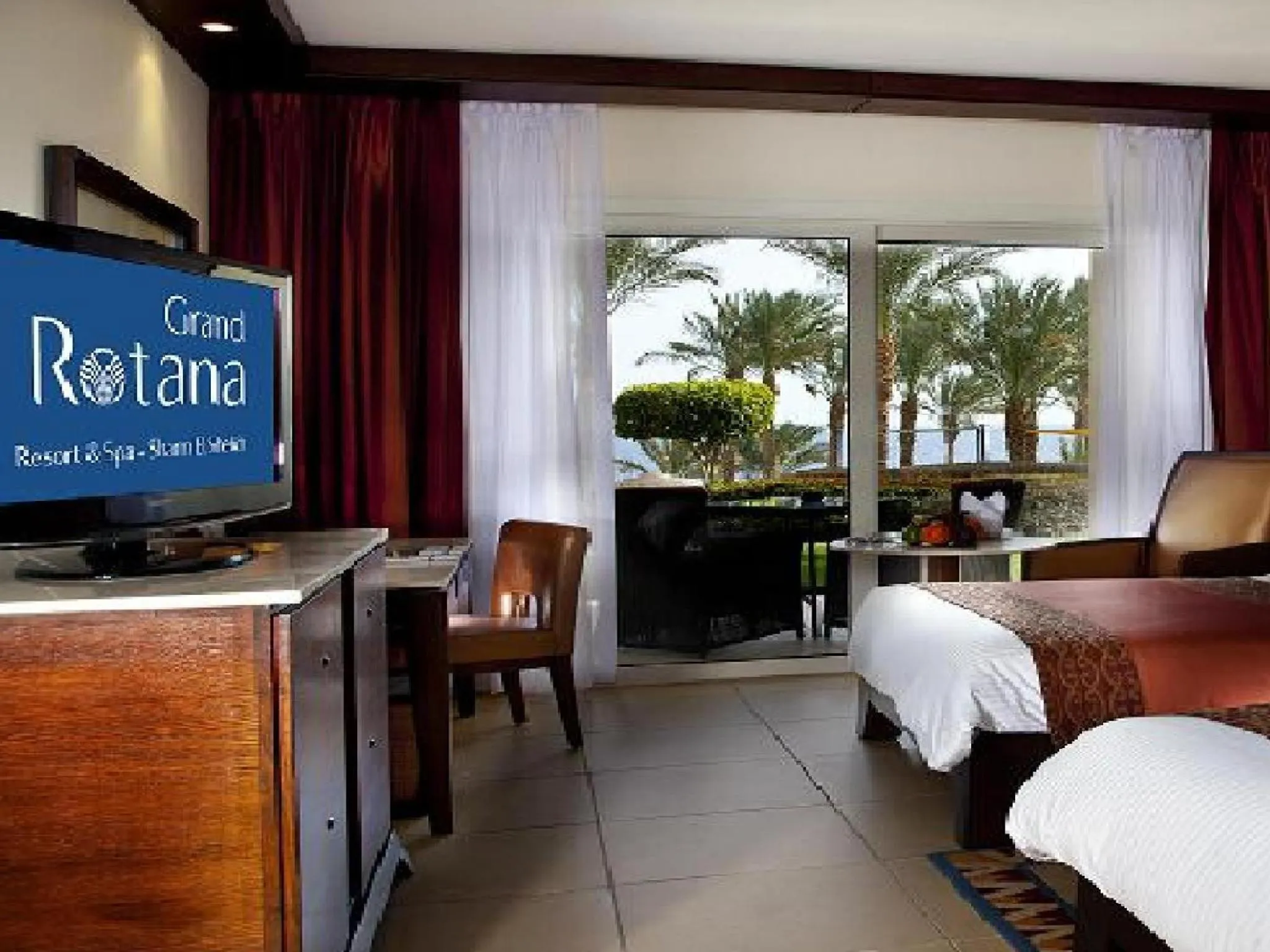 Photo of the whole room, Bed in Grand Rotana Resort & Spa