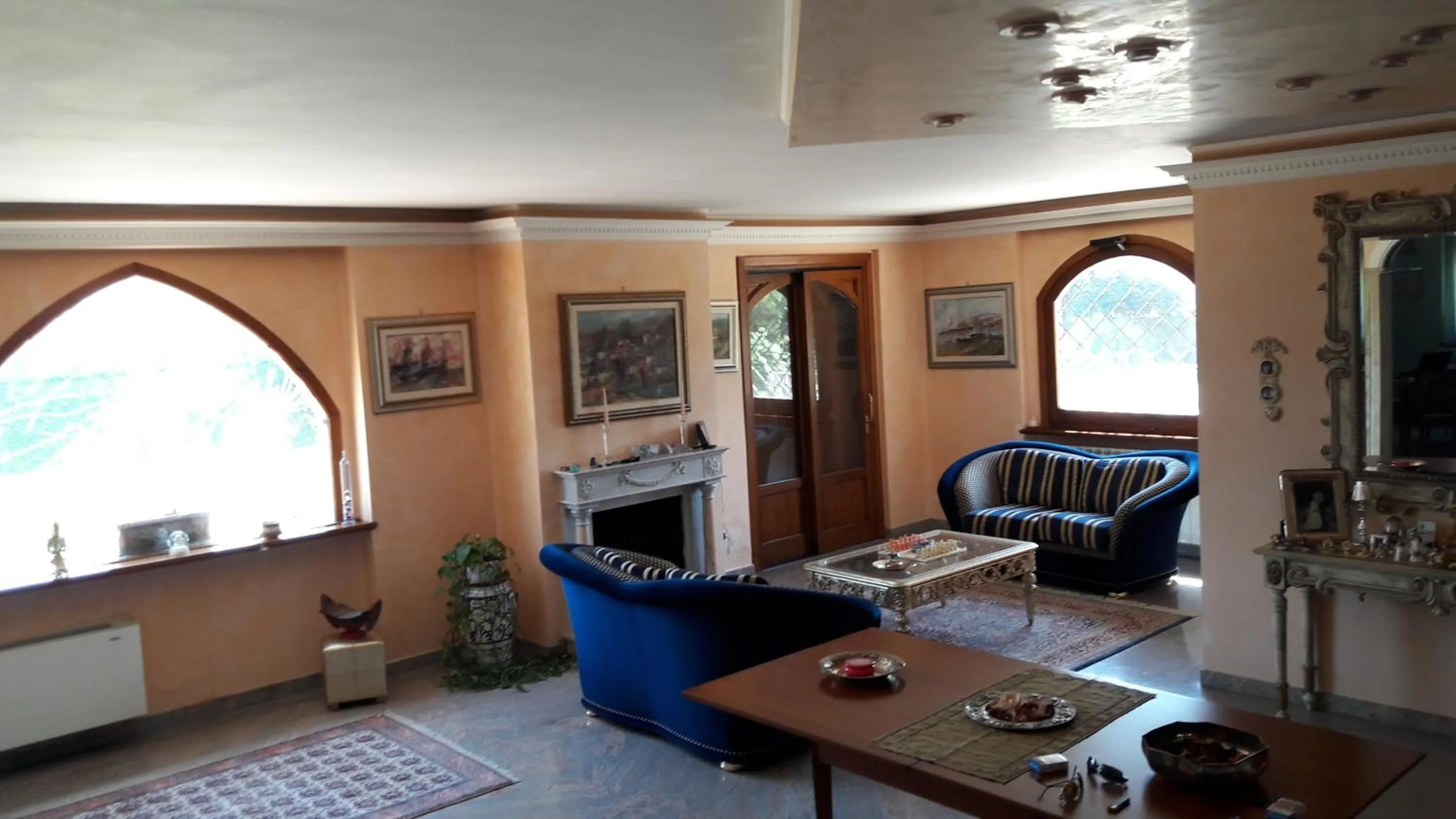 Communal lounge/ TV room in B&B Villa Roberta