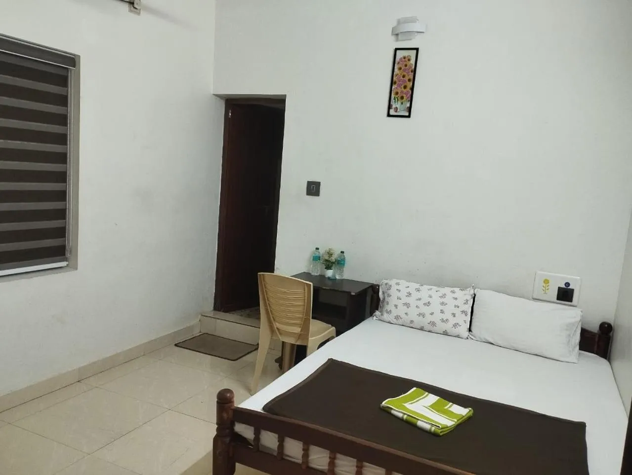 Bed in Athirappilly Ambady Resort