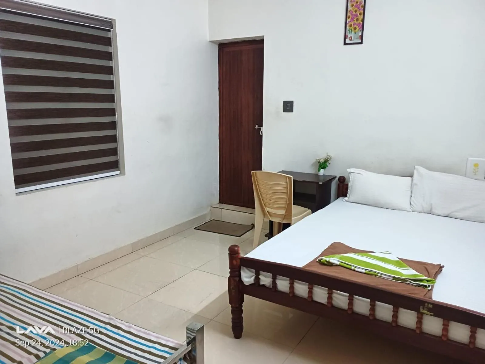 Bed in Athirappilly Ambady Resort