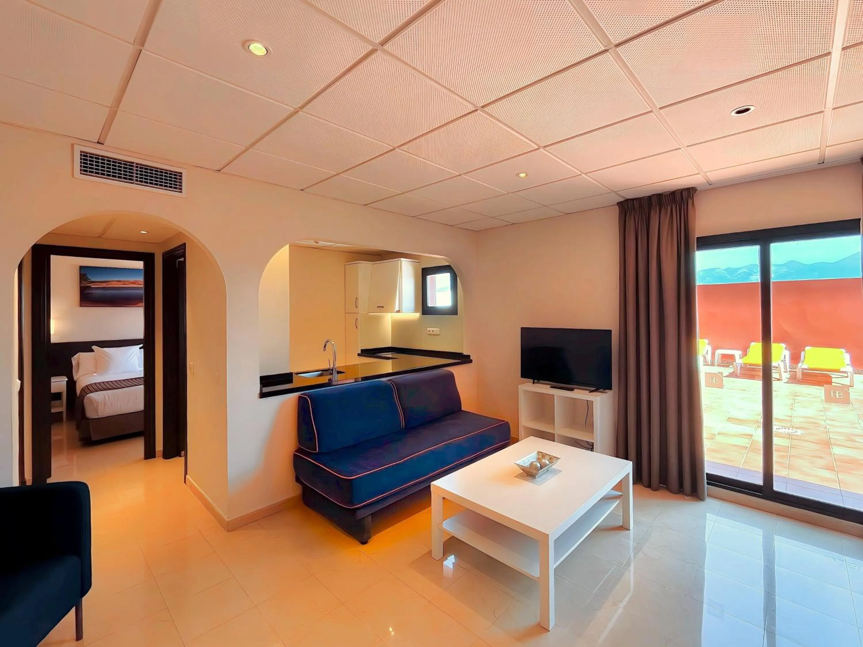 Living room, Bed in Fuengirola Beach Apartamentos Turísticos