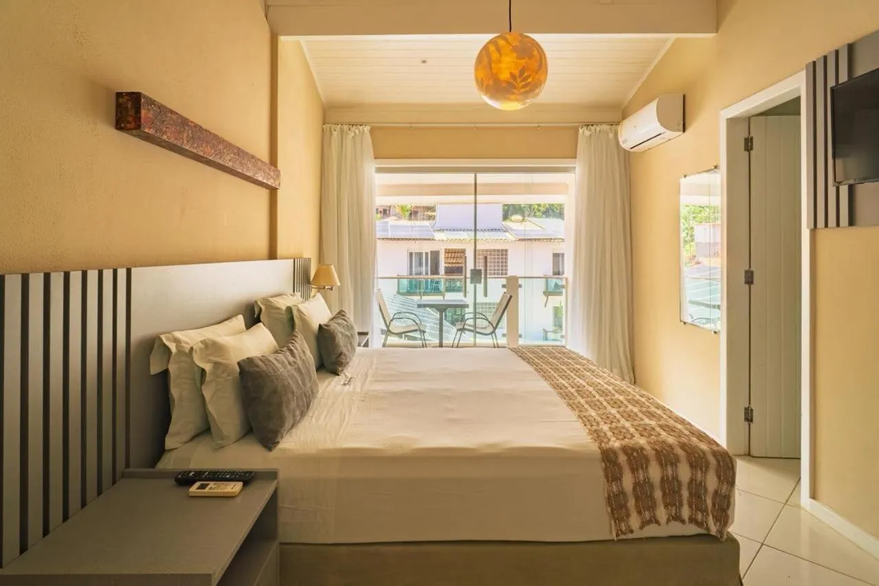 Bed in Pousada Mareia